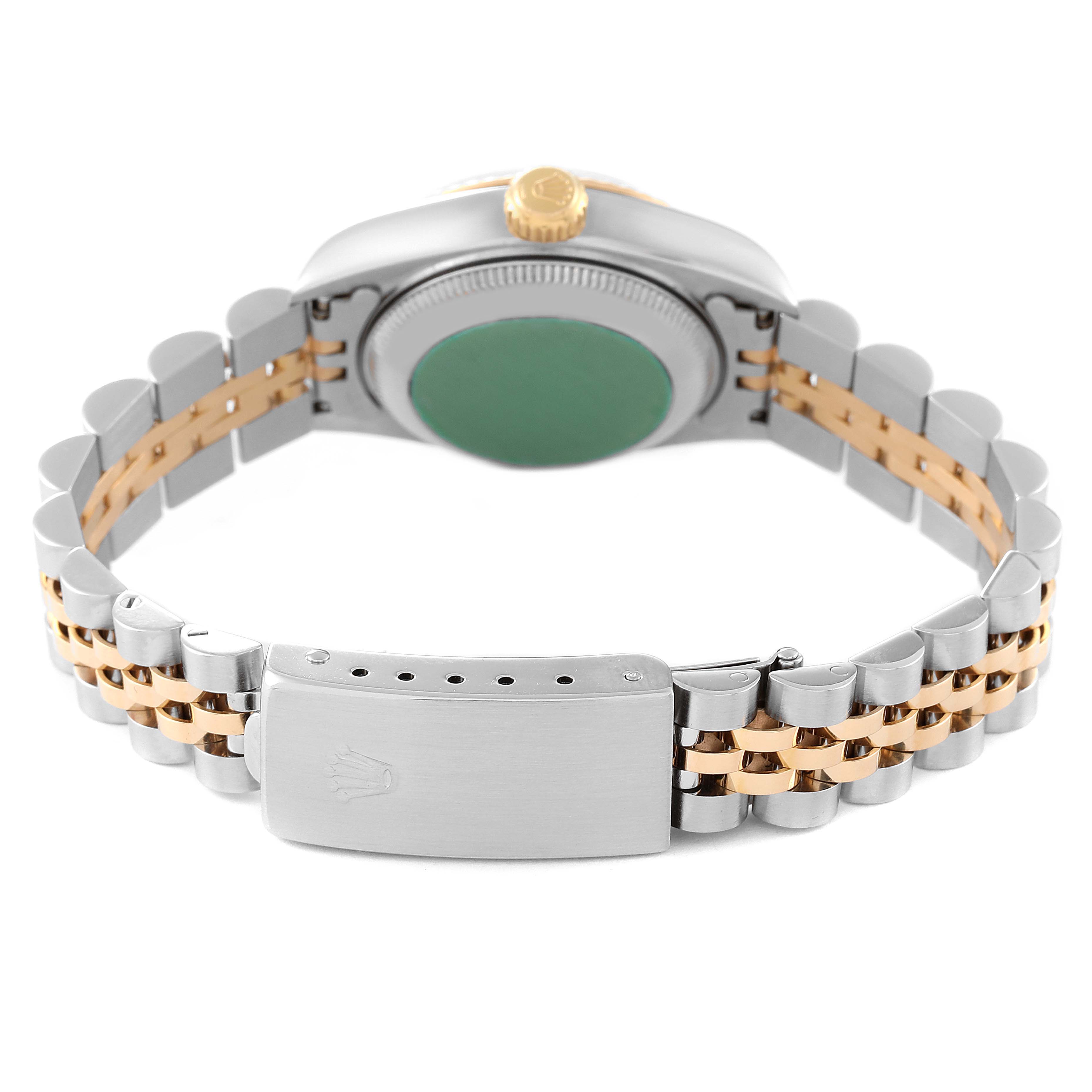 The image shows the back view of a Datejust Rolex watch, highlighting the case back, crown, and Jubilee bracelet.