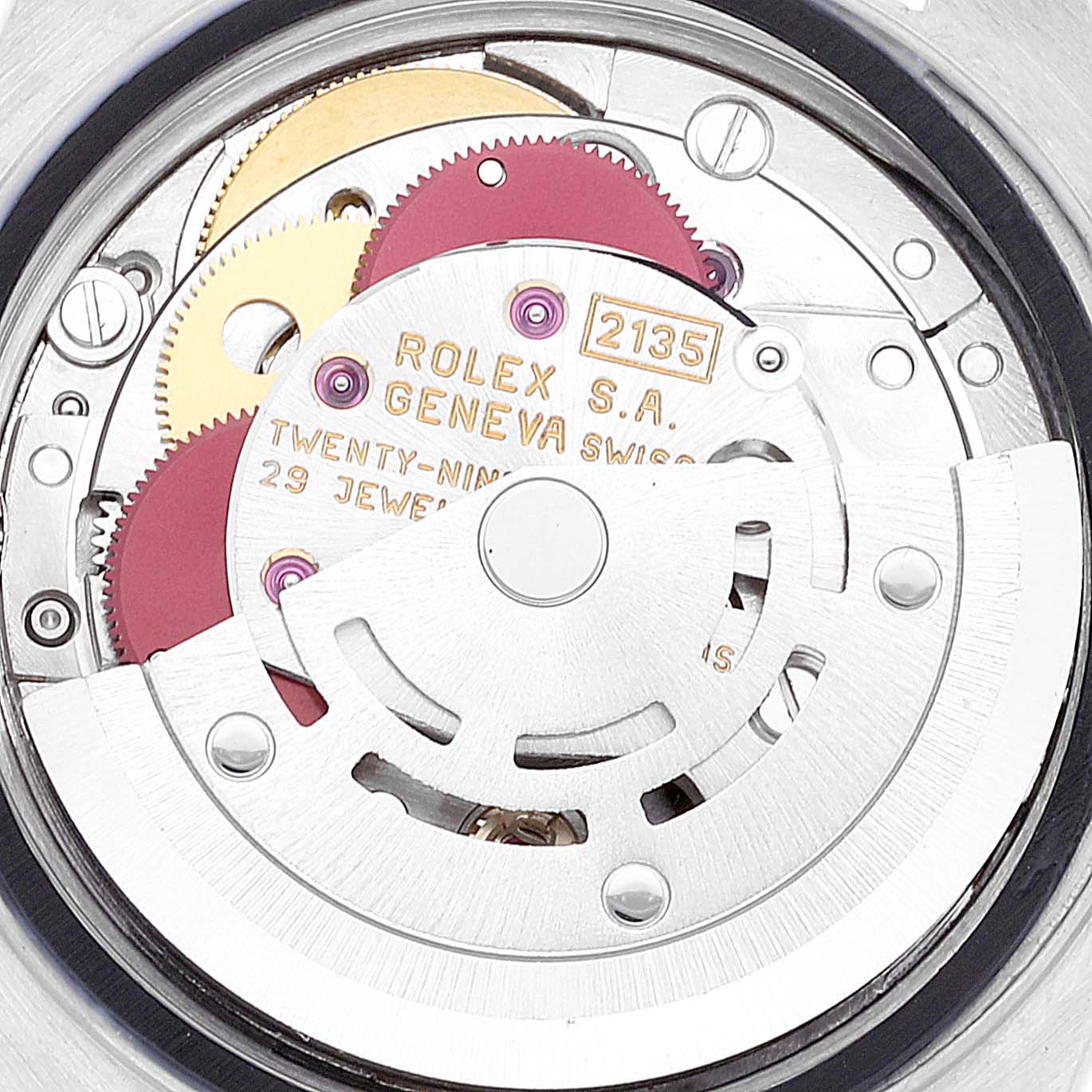 This image shows a close-up view of the movement mechanism of the Rolex Datejust 69173 Women's Steel and Gold (two tone) Mother of Pearl Dial 69173 Women's Steel and Gold (two tone) Mother of Pearl Dial watch, including the rotor and gear train.