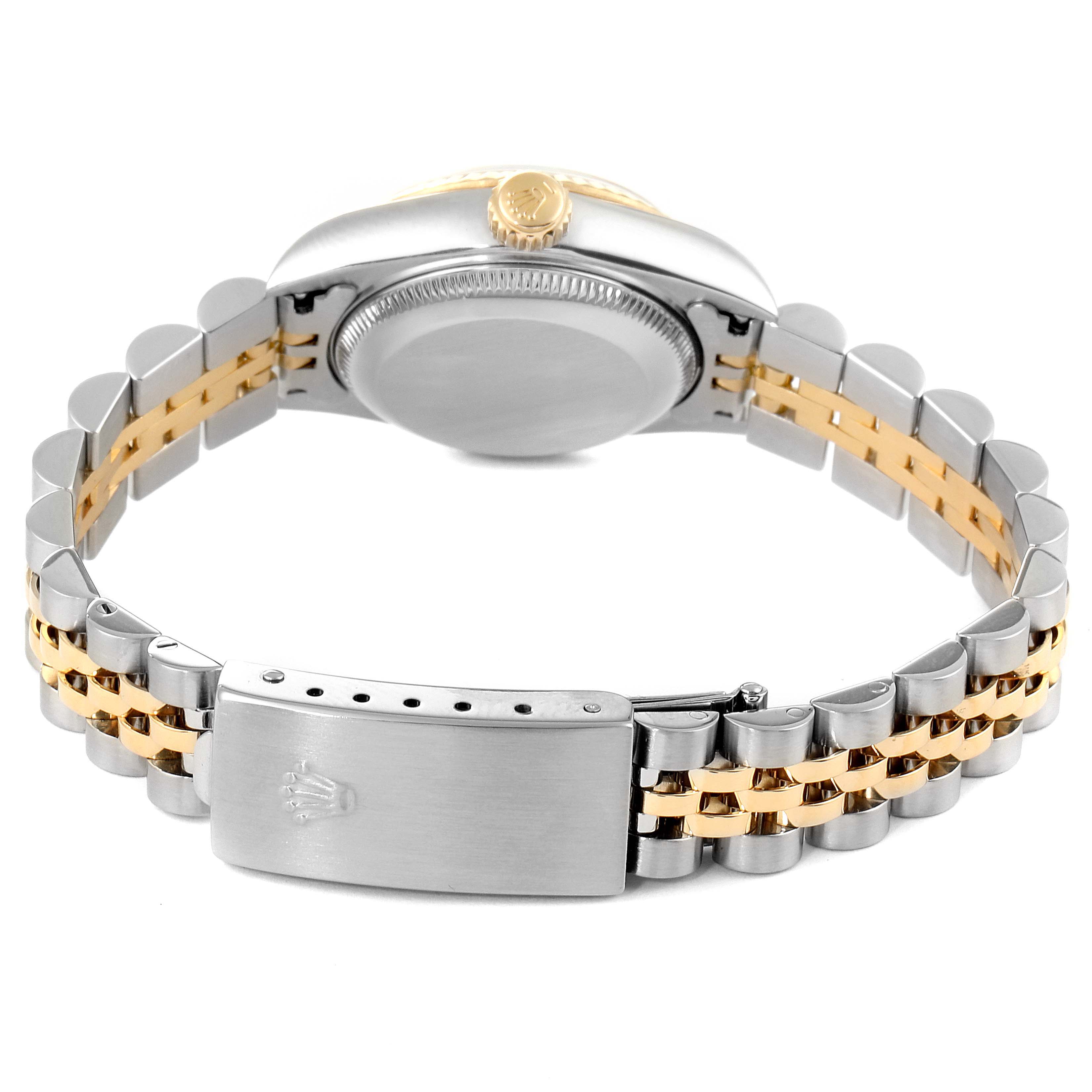 This image shows the back view of a Rolex Datejust 79173 Women
s Steel and Gold (two tone) Mother of Pearl Dial 79173 Women
s Steel and Gold (two tone) Mother of Pearl Dial watch, focusing on the case back and the two-tone Jubilee bracelet with the clasp.