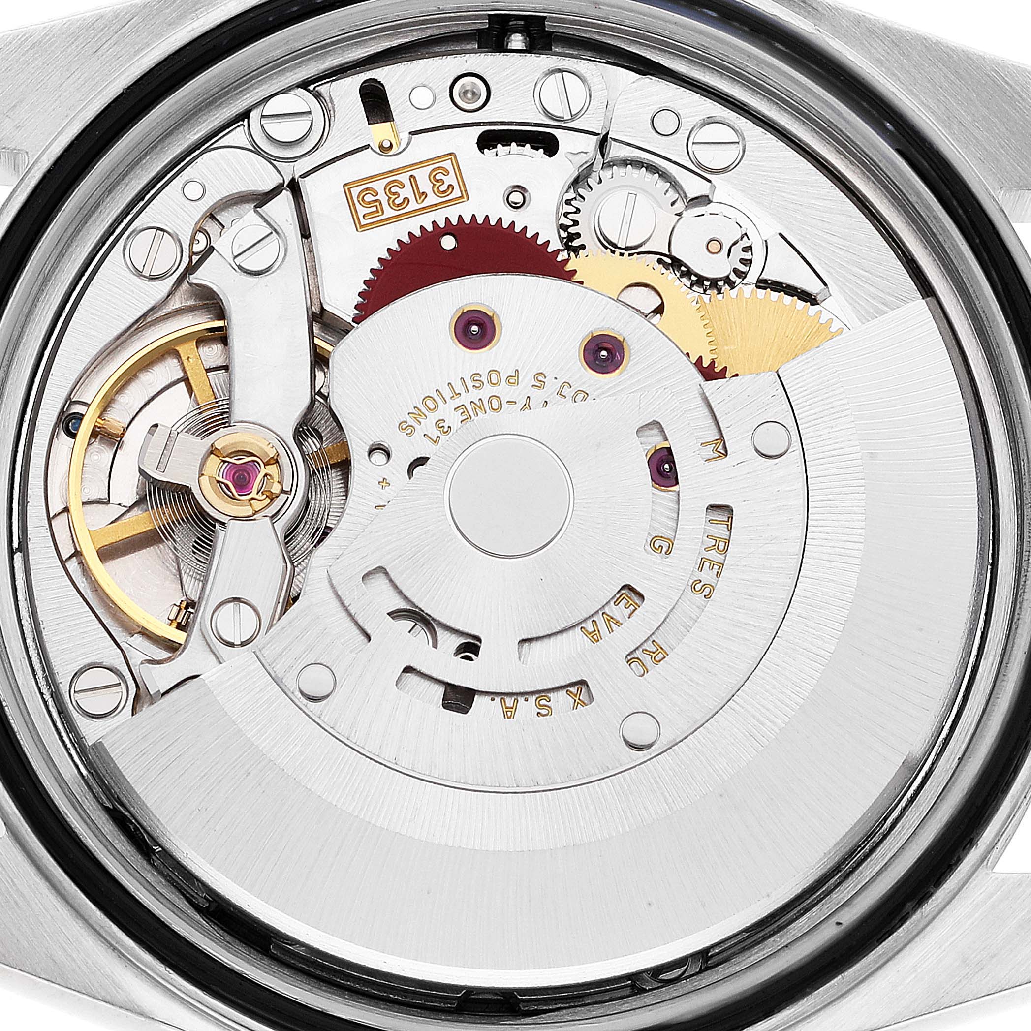 This image shows the mechanical movement inside the Rolex Datejust 16233 Men's Steel and Gold (two tone) Mother of Pearl Dial 16233 Men's Steel and Gold (two tone) Mother of Pearl Dial watch, viewed from the back.