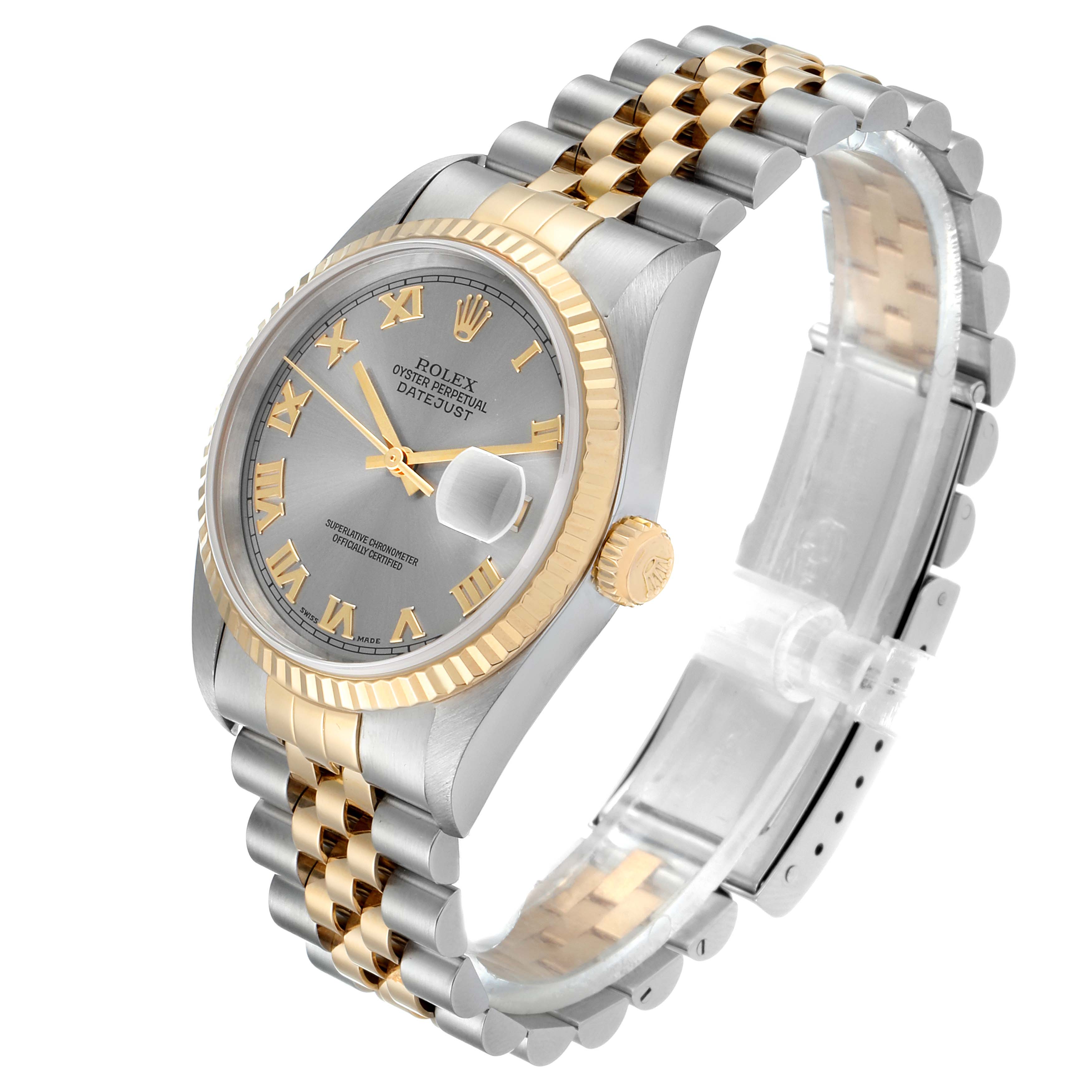 The image shows a Rolex Datejust 16233 Men
s Steel and Gold (two tone) Grey Dial 16233 Men
s Steel and Gold (two tone) Grey Dial watch at an angle highlighting its two-tone bracelet, fluted bezel, and silver dial with Roman numerals.