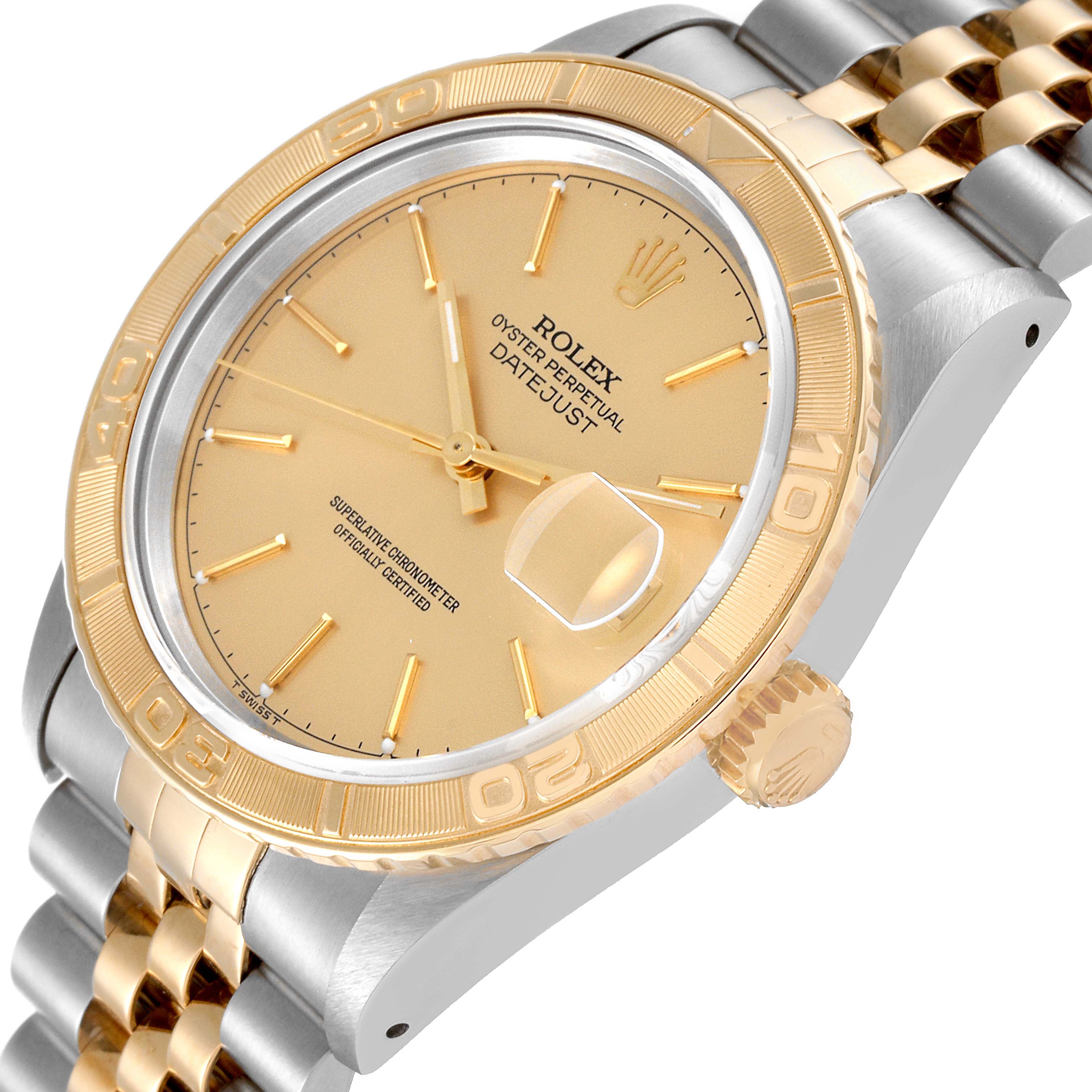 This image shows a Rolex Turn-o-Graph 16263 Men's Steel and Gold (two tone) Champagne Dial 16263 Men's Steel and Gold (two tone) Champagne Dial watch at an oblique angle, highlighting its gold dial, bezel, crown, and two-tone bracelet.