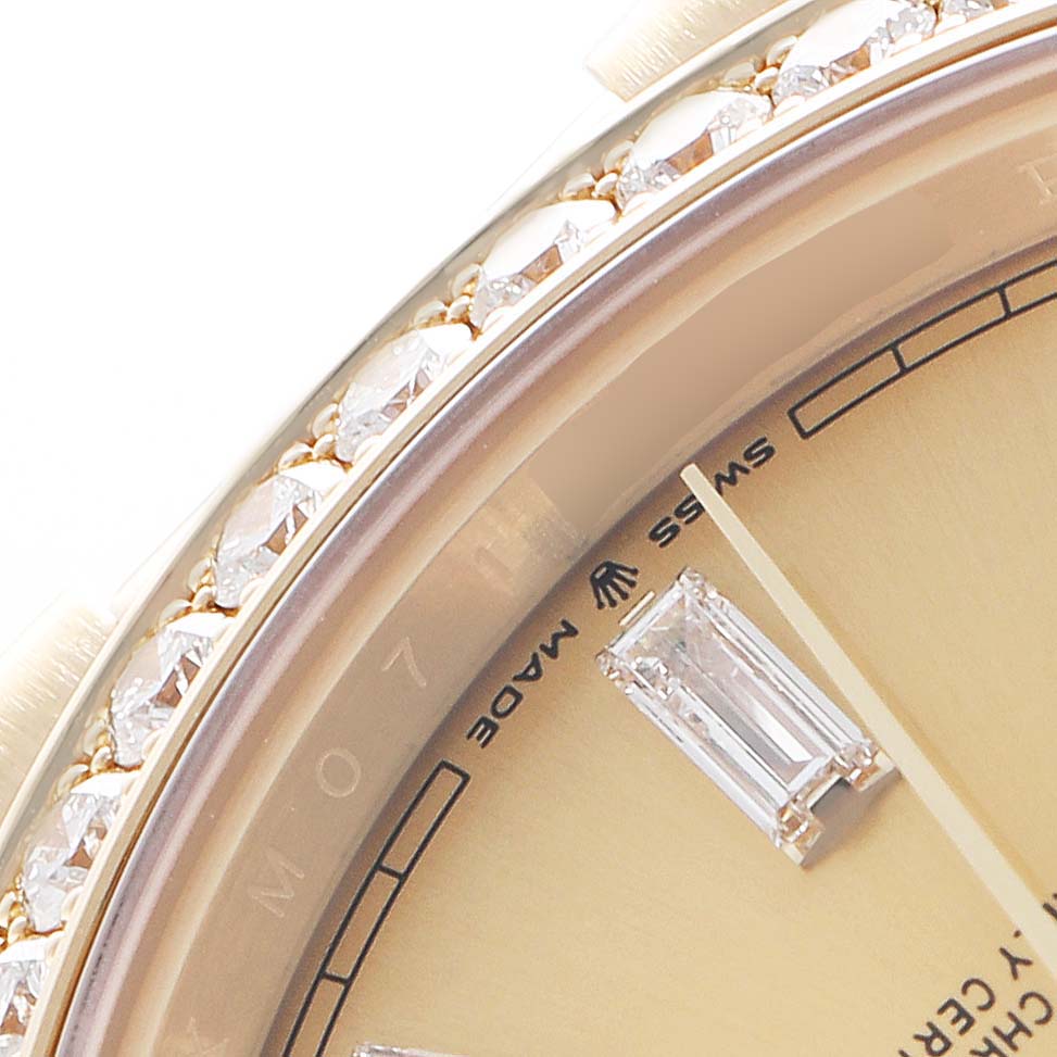 The image shows a close-up of the Rolex President 228348 Men's Yellow Gold Champagne Dial model, highlighting the diamond bezel and part of the dial.