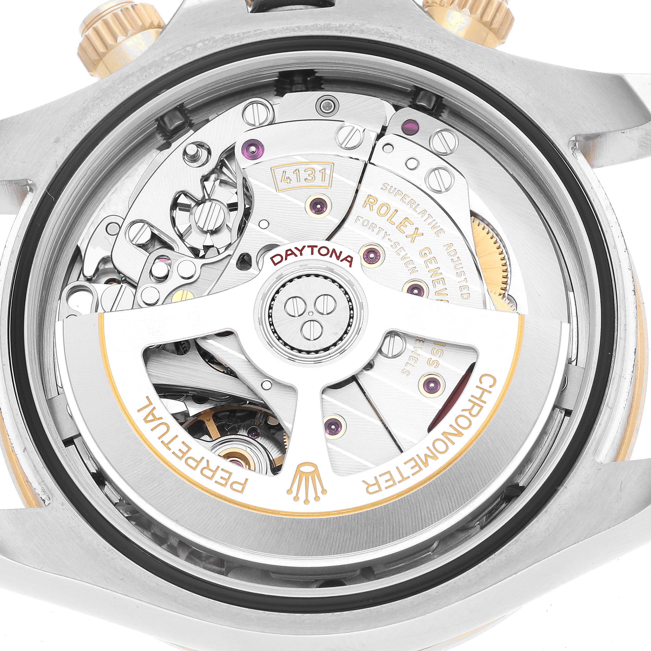 The image shows the Rolex Daytona 126503 Men's Steel and Gold (two tone) Black Dial's movement and inner mechanics from a back angle.