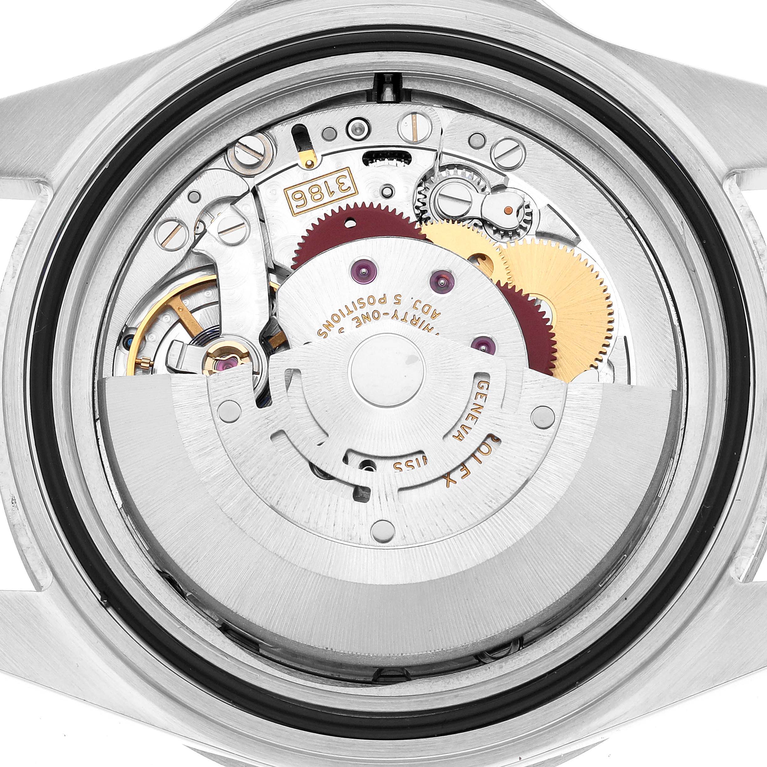The image shows the internal mechanism of a Rolex Explorer 16570 Men's Stainless Steel White Dial watch, focusing on gears and the rotor from the back.