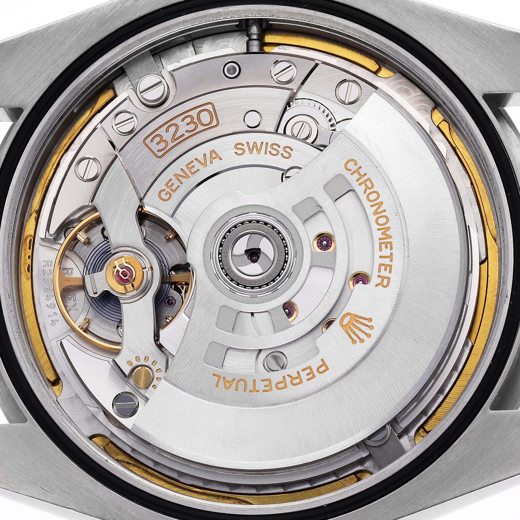 The image shows the back view of a Rolex Oyster Perpetual 124300 Men's Stainless Steel Blue Dial watch, highlighting its intricate movement mechanism.