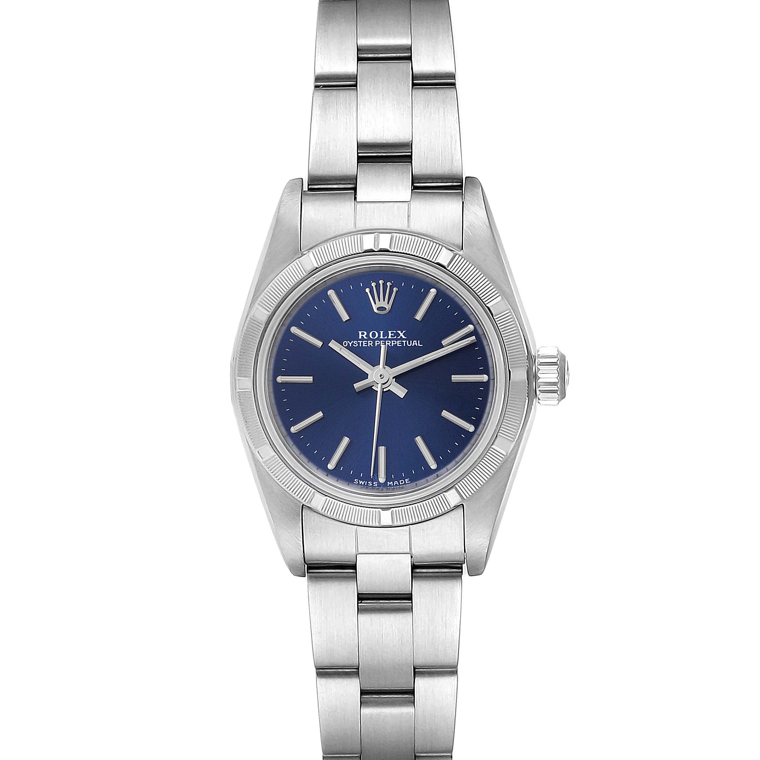 The Rolex Oyster Perpetual 76030 Women
s Stainless Steel Blue Dial 76030 Women
s Stainless Steel Blue Dial watch is shown from a front angle, displaying the dial, bezel, and bracelet clearly.