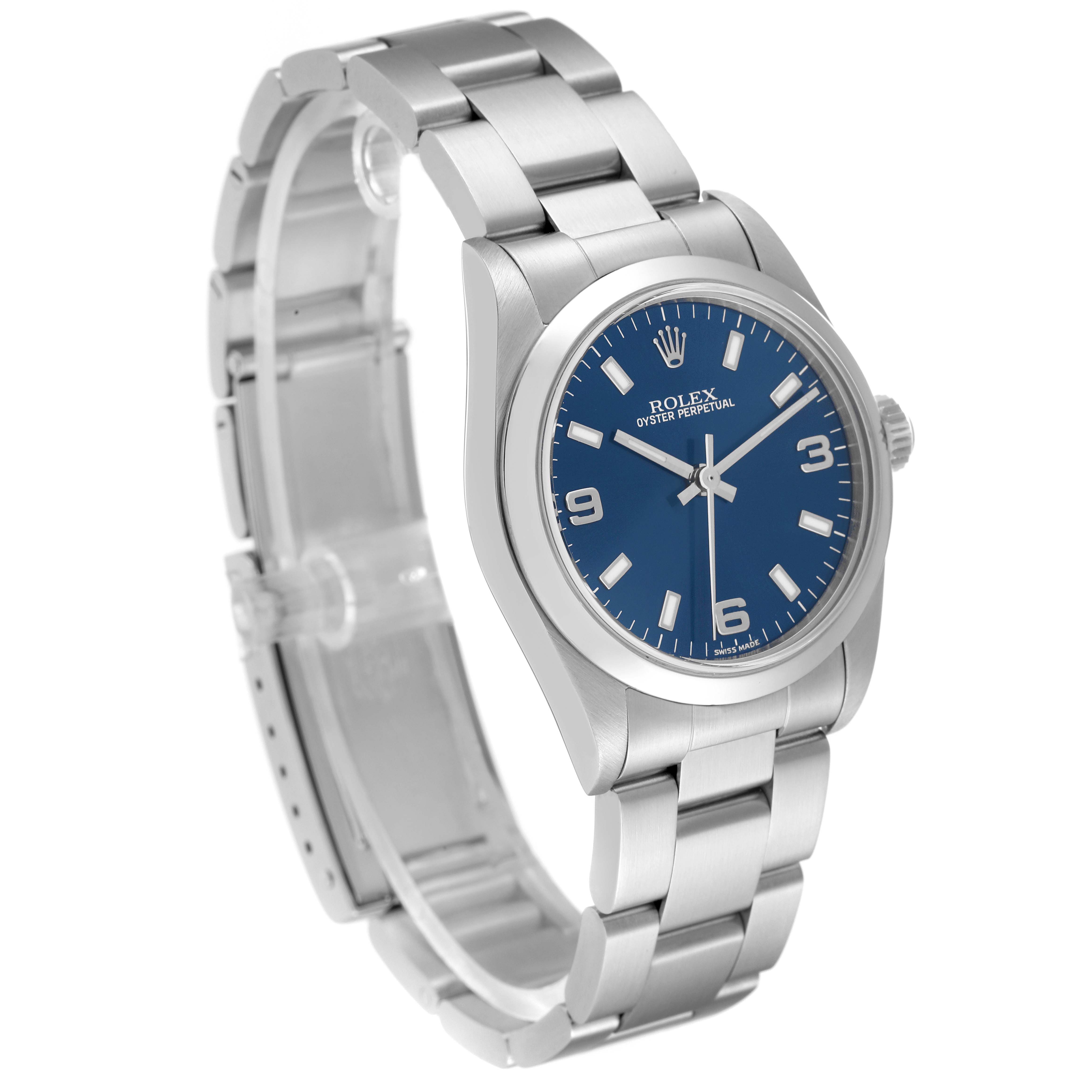 The image shows a Rolex Mid-Size 77080 Women
s Stainless Steel Blue Dial 77080 Women
s Stainless Steel Blue Dial Oyster Perpetual watch at a three-quarter angle, displaying the watch face, bezel, and bracelet.