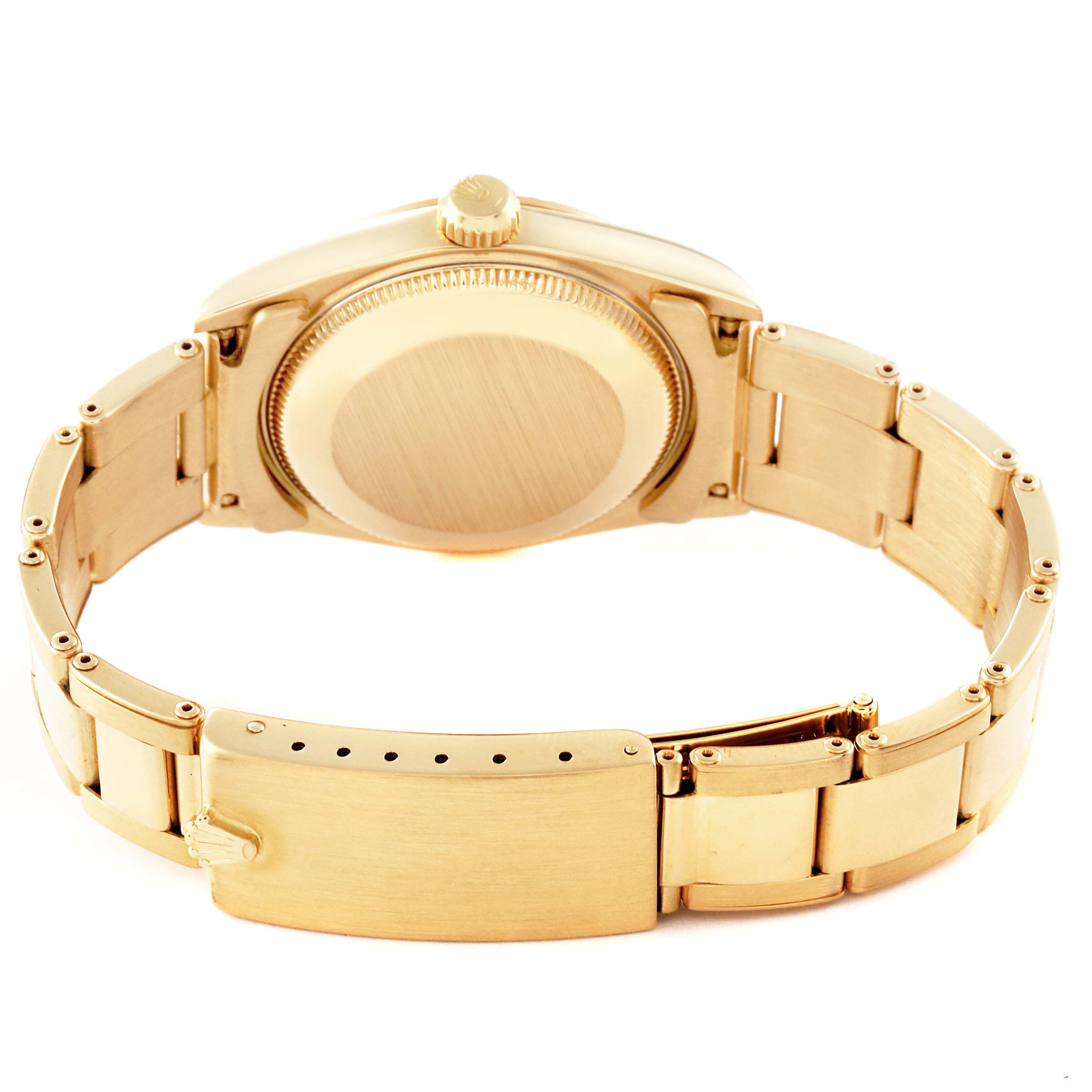 The image shows the back view of a Rolex President 67518 Women
s Yellow Gold White Dial 67518 Women
s Yellow Gold White Dial model, highlighting the bracelet, clasp, and case back.