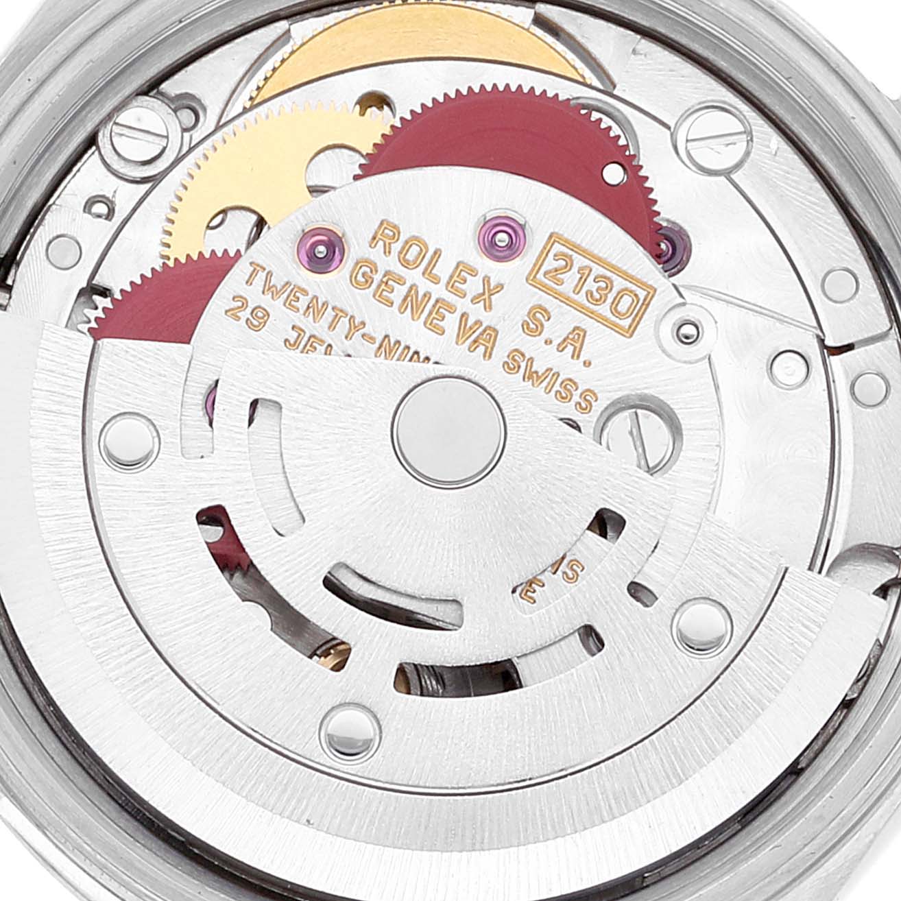 The image shows the movement and internal gears of a Rolex Oyster Perpetual 67180 Women's Stainless Steel Pink Dial 67180 Women's Stainless Steel Pink Dial watch, specifically the model 2130.