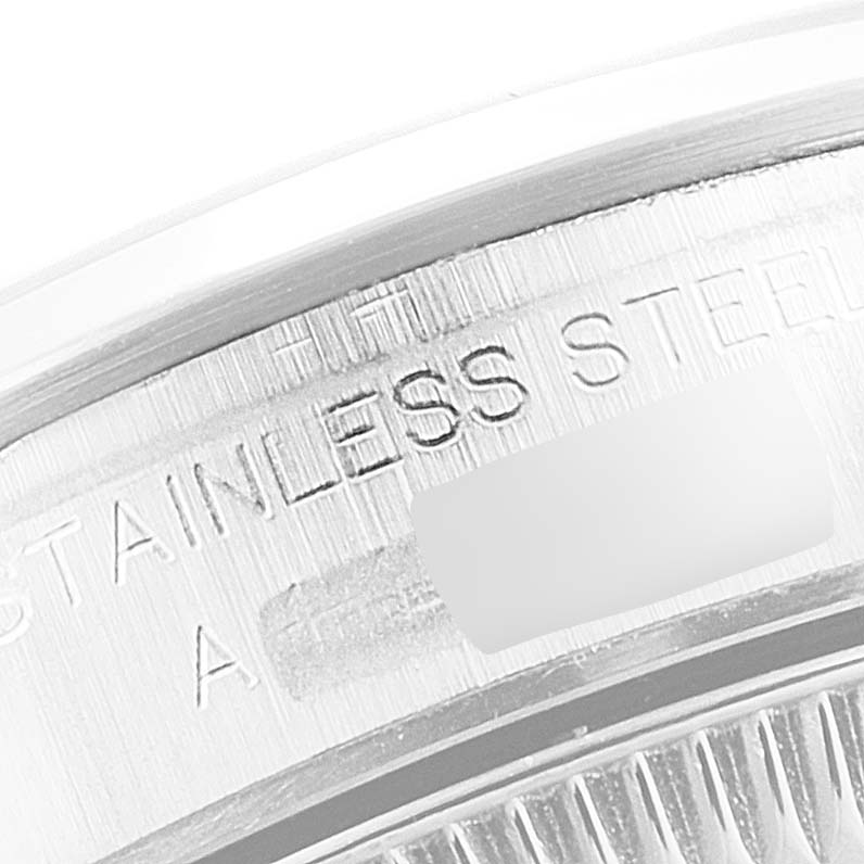 This image shows a close-up view of the edge and partial back casing of a Rolex Oyster Perpetual 67180 Women
s Stainless Steel Pink Dial 67180 Women
s Stainless Steel Pink Dial watch.