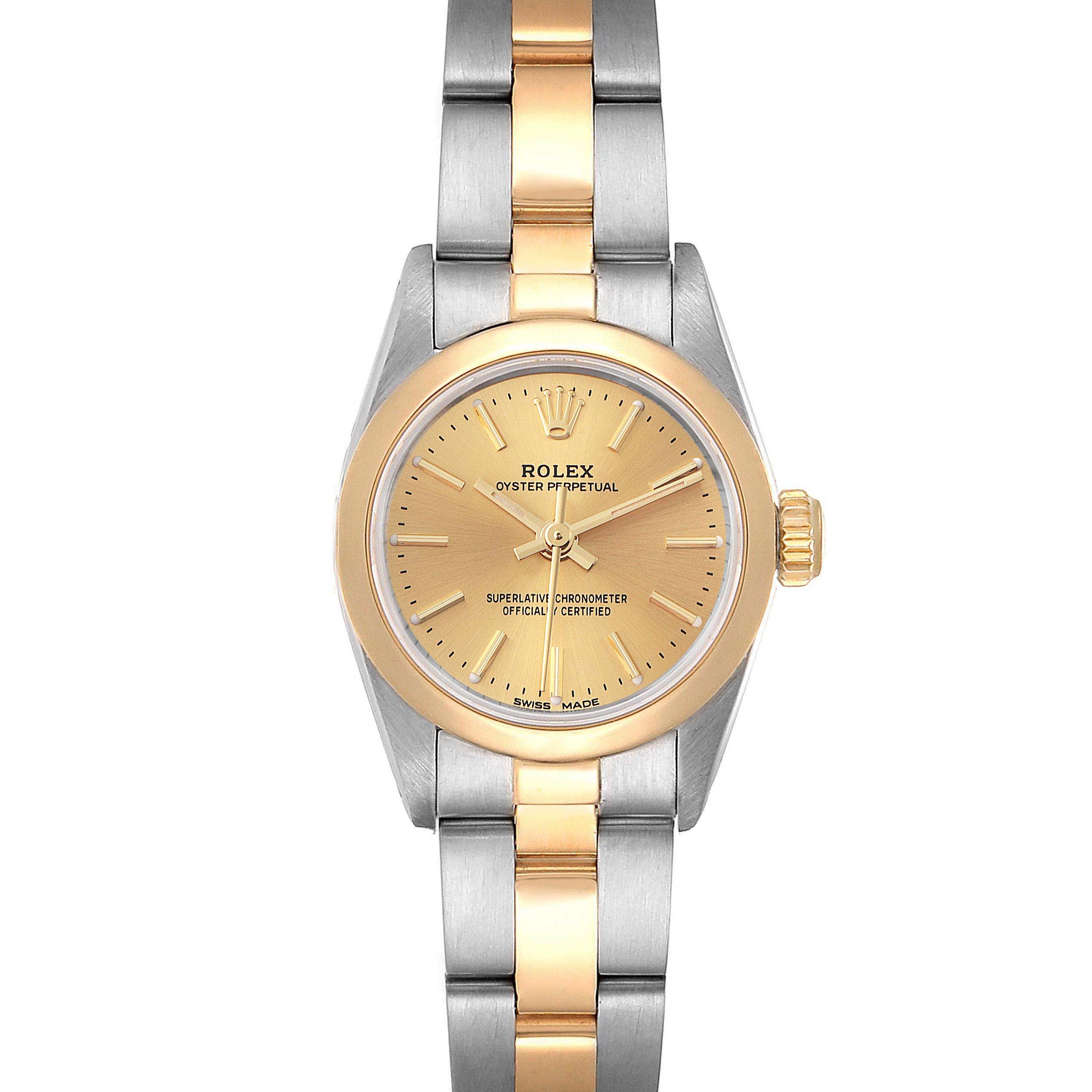 The image shows a frontal view of a Rolex Oyster Perpetual 67183 Women
s Steel and Gold (two tone) Champagne Dial 67183 Women
s Steel and Gold (two tone) Champagne Dial watch with a two-tone gold and silver bracelet.