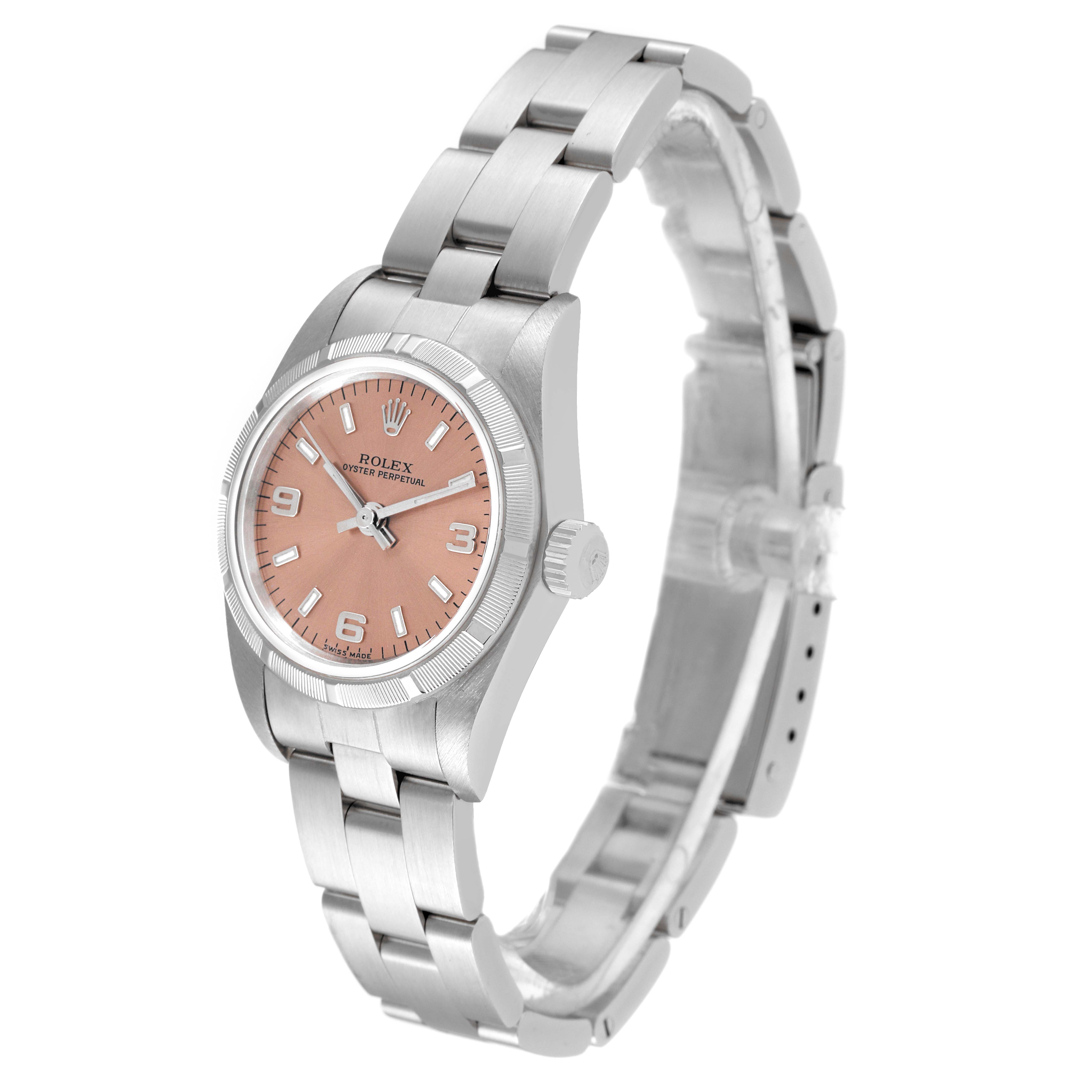 The image shows a Rolex Oyster Perpetual 76030 Women's Stainless Steel Pink Dial 76030 Women's Stainless Steel Pink Dial watch at a slight angle, highlighting the face, bezel, crown, and bracelet.