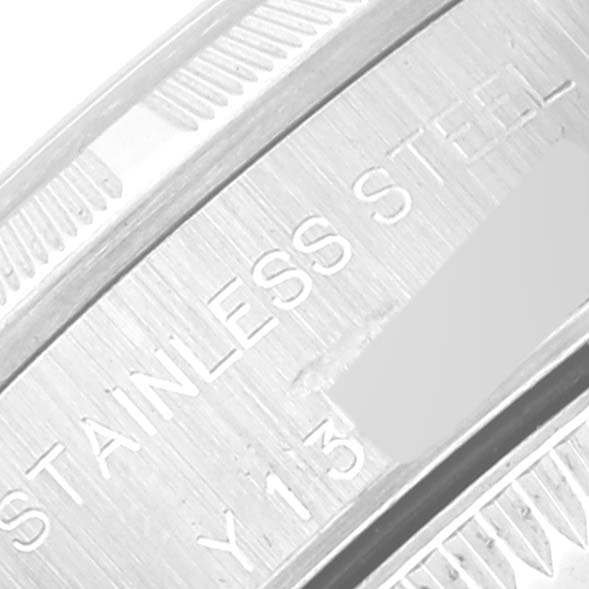 This image shows a close-up of the side engraving on the bezel of the Rolex Oyster Perpetual 76030 Women
s Stainless Steel Pink Dial 76030 Women
s Stainless Steel Pink Dial watch.