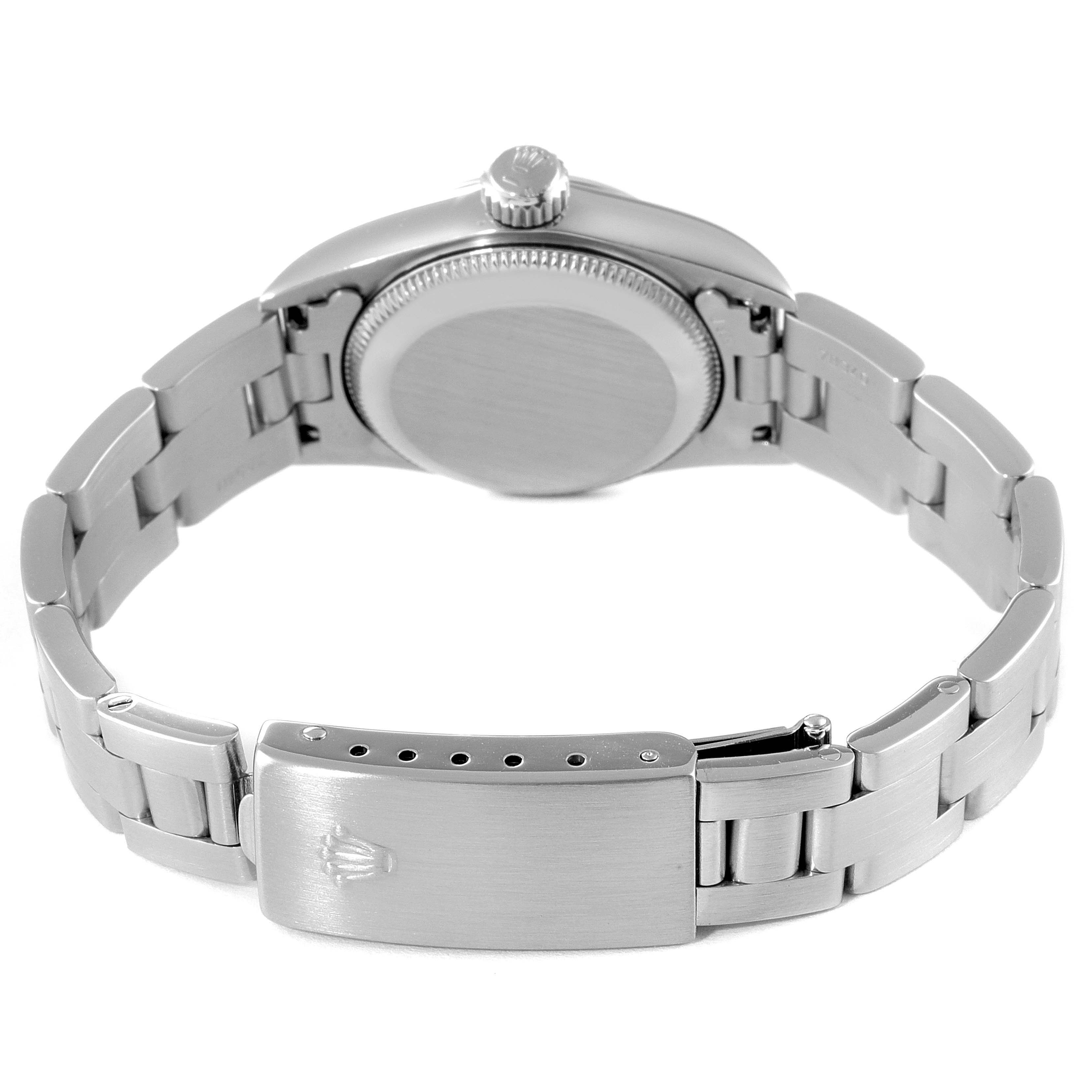 This image shows the back view of the Rolex Oyster Perpetual 67180 Women's Stainless Steel Black Dial 67180 Women's Stainless Steel Black Dial watch, focusing on its case back and bracelet with clasp.