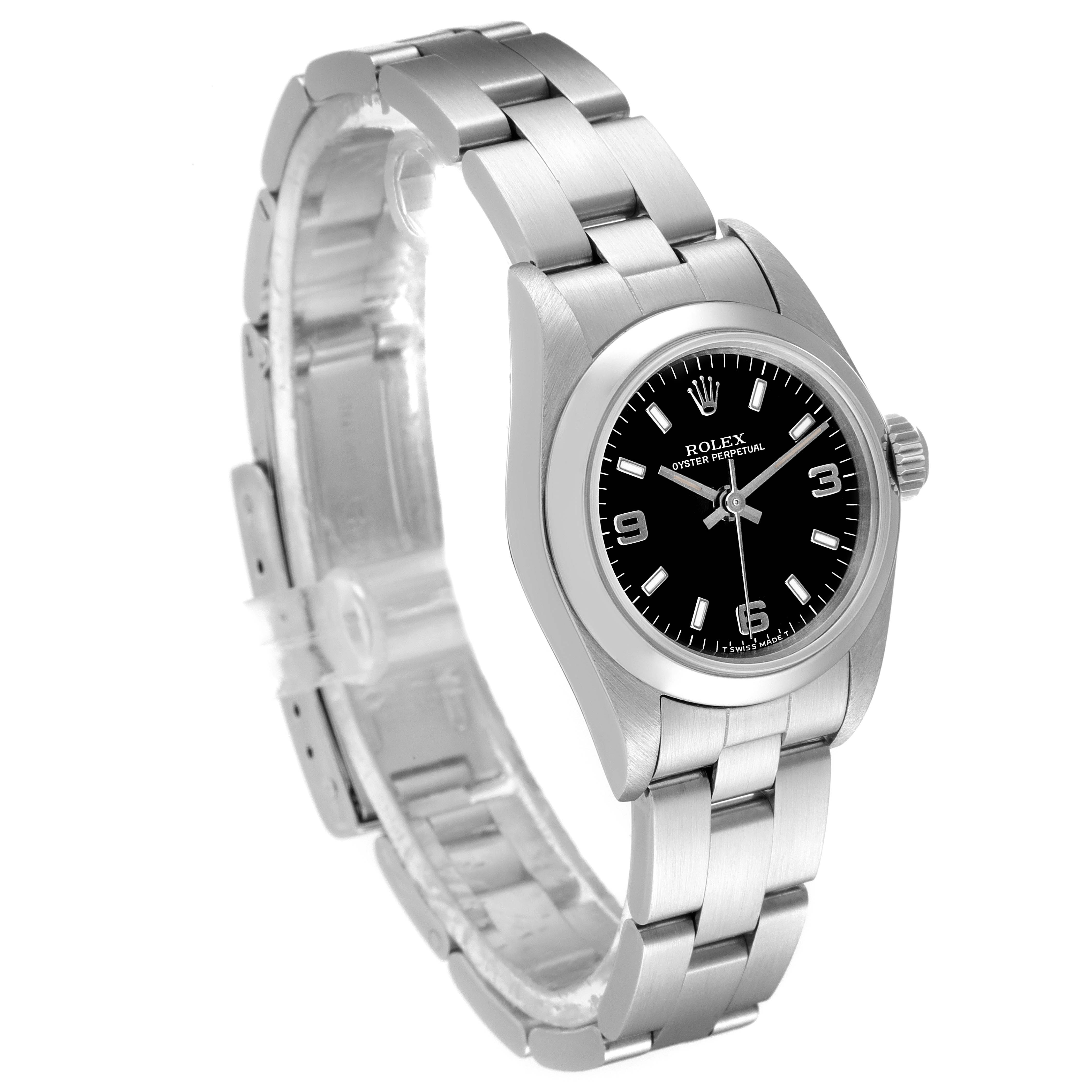 The image shows a Rolex Oyster Perpetual 67180 Women's Stainless Steel Black Dial 67180 Women's Stainless Steel Black Dial watch at an angled side view, featuring the watch face, bracelet, and clasp.