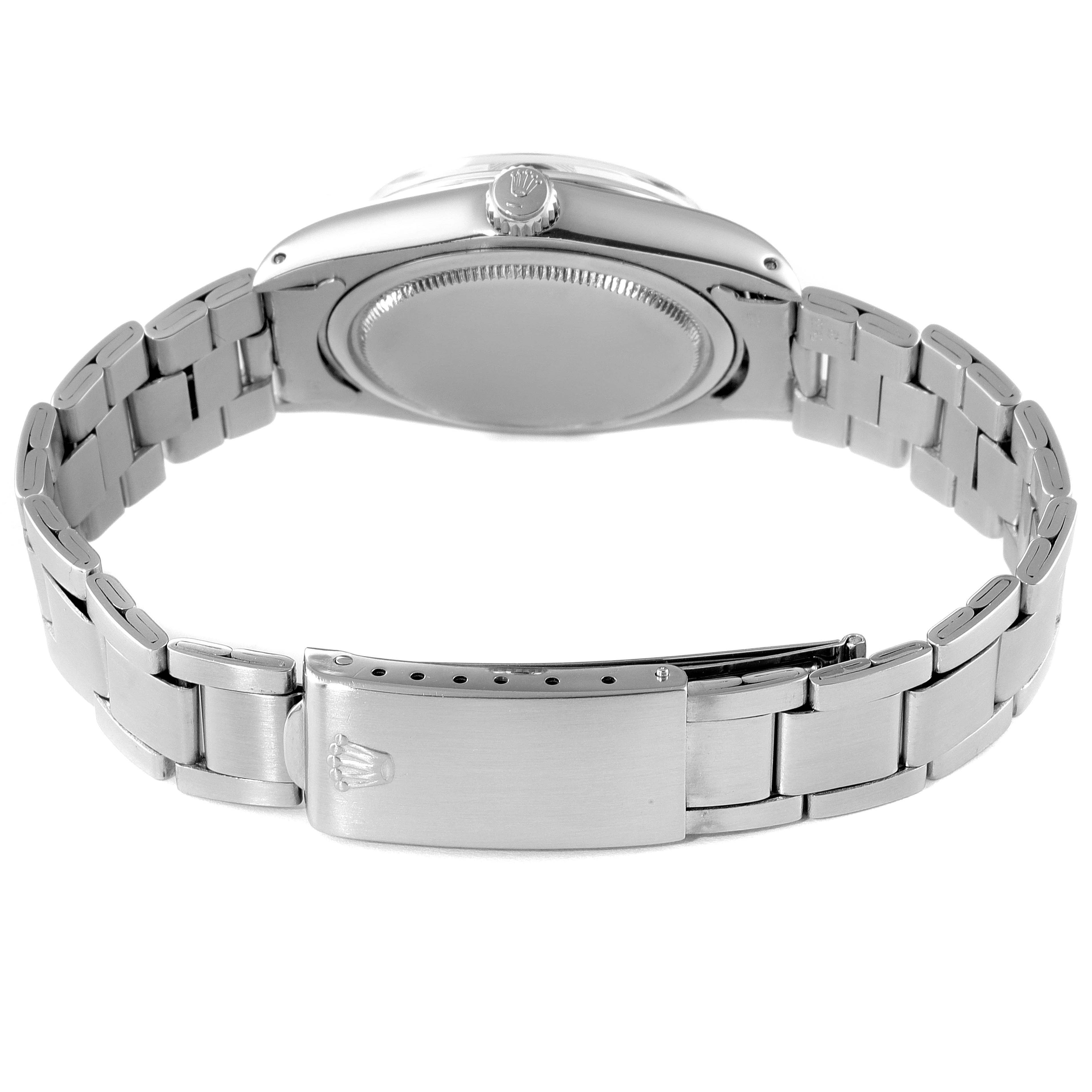 The image shows the back side and clasp of a Rolex Vintage Collection 6694 Men's Stainless Steel Black Dial 6694 Men's Stainless Steel Black Dial watch.