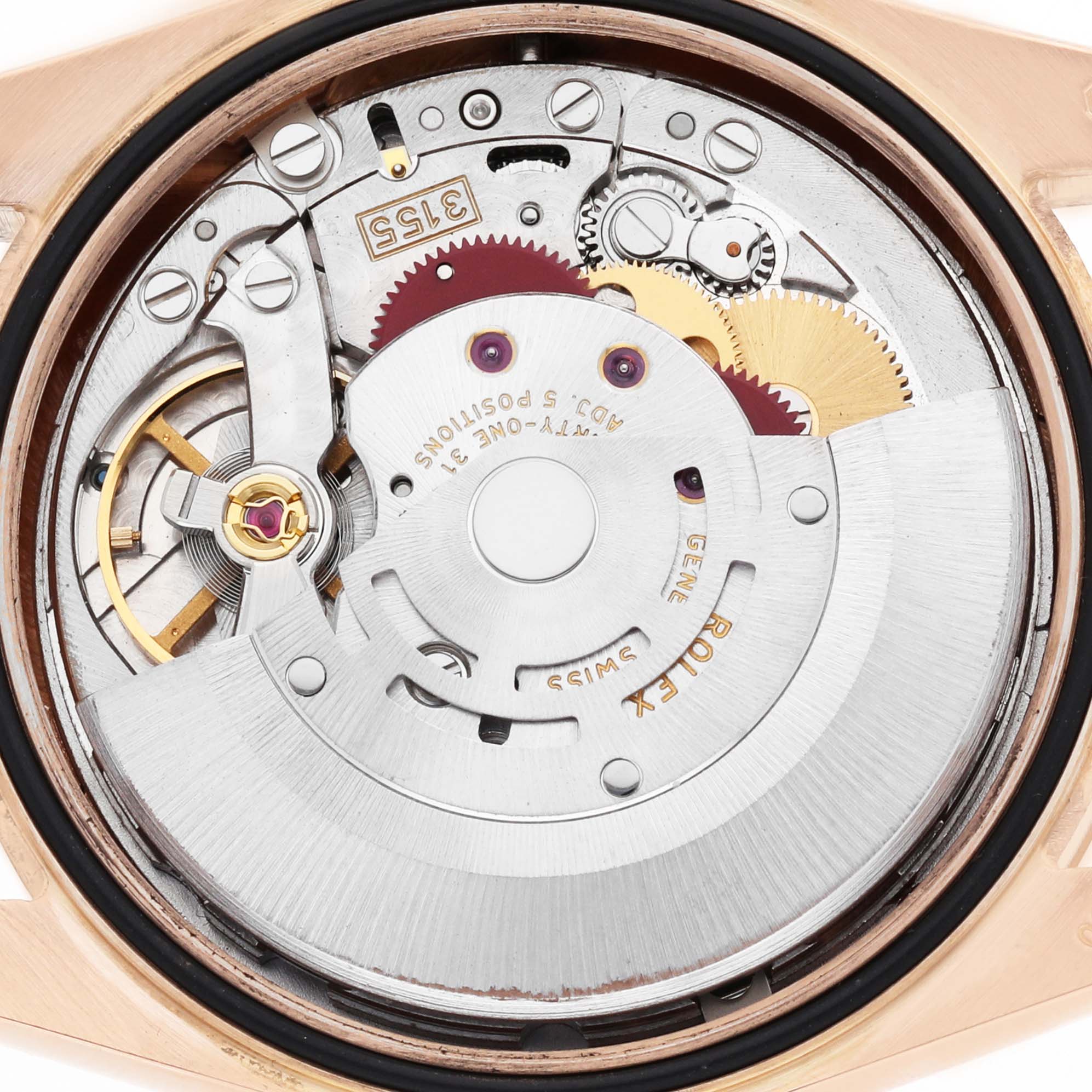 The image shows the movement of the Rolex President 118235 Men's Rose Gold Pink Dial model from a rear angle, displaying gears and the rotor.