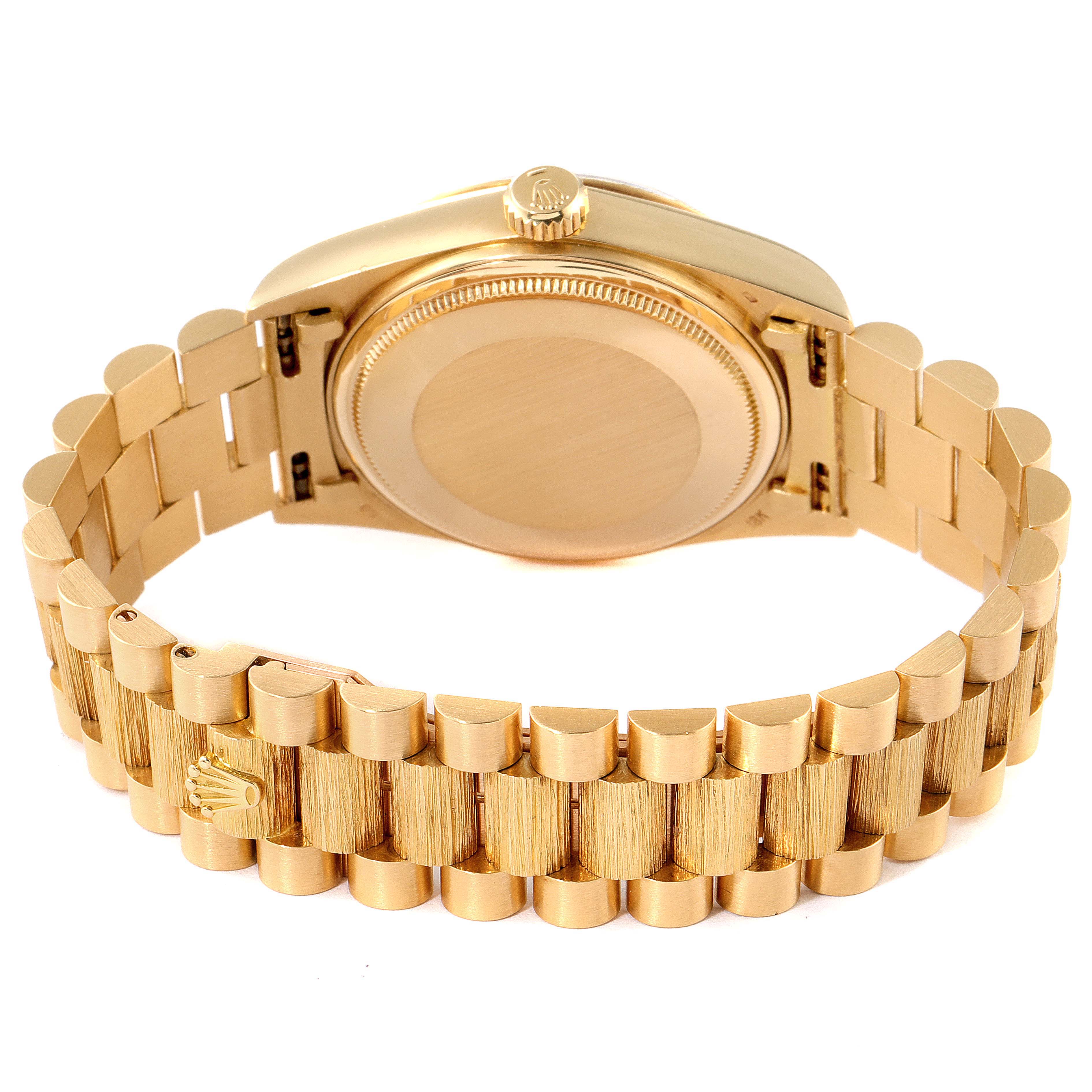 This image shows the back casing and bracelet of a Rolex President 18078 Men
s Yellow Gold Silver Dial 18078 Men
s Yellow Gold Silver Dial model watch.