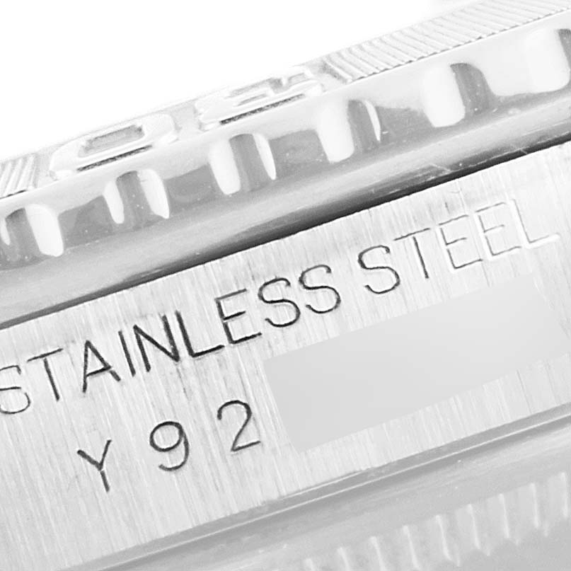 This image shows a close-up angle of the bezel and case part of a Rolex Turn-o-Graph 16264 Men
s Stainless Steel Black Dial 16264 Men
s Stainless Steel Black Dial watch, highlighting the "STAINLESS STEEL" engraving.