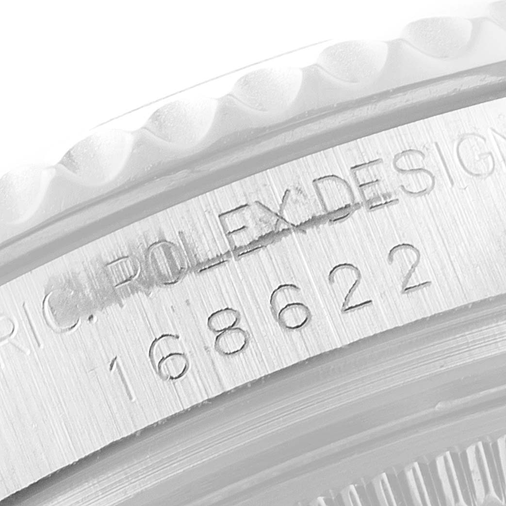 The image shows a close-up view of the serial number engraving on the case side of a Rolex Yacht-Master 168622 Men's Stainless Steel Silver Dial 168622 Men's Stainless Steel Silver Dial watch.