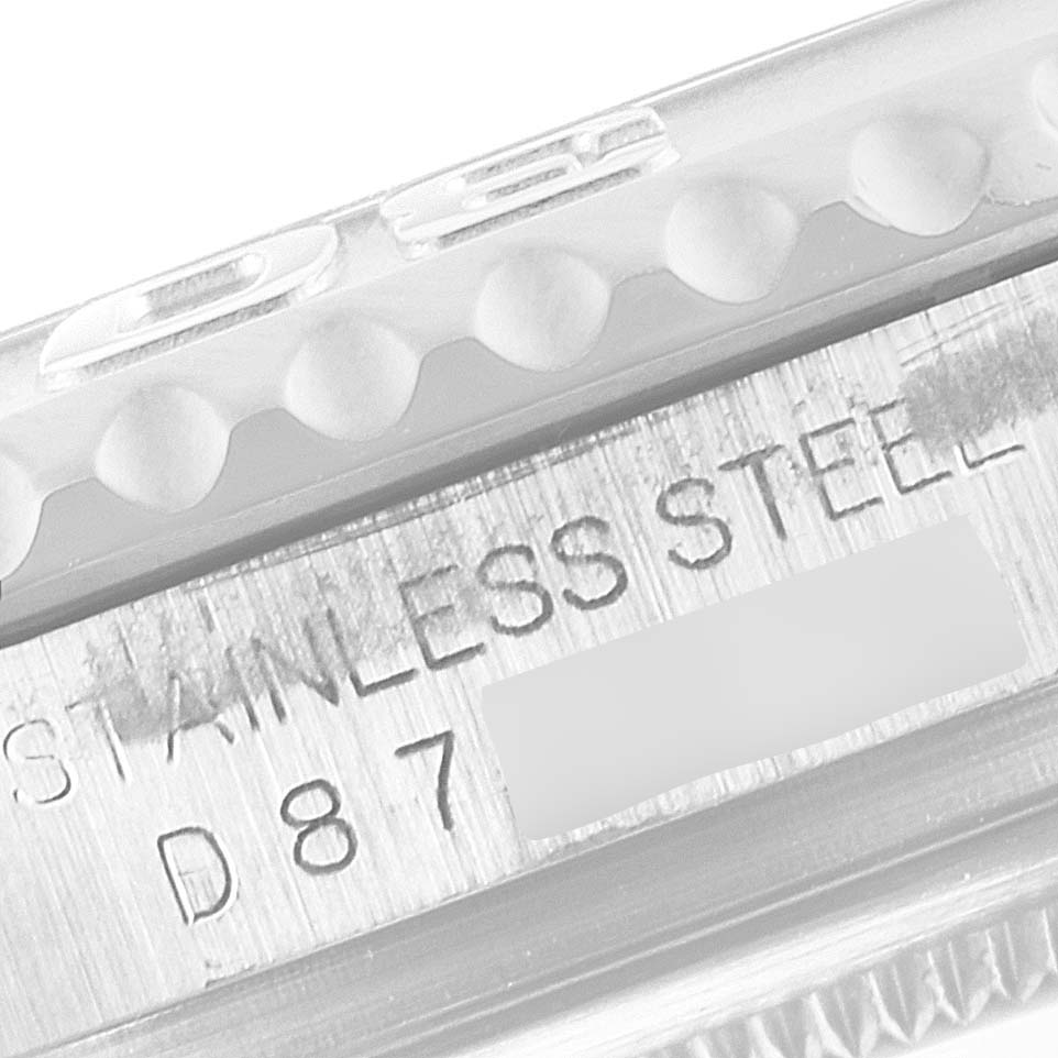 The image shows a close-up of the bezel and engraved stainless steel text on the Rolex Yacht-Master 16622 Men
s Stainless Steel Silver Dial 16622 Men
s Stainless Steel Silver Dial watch.