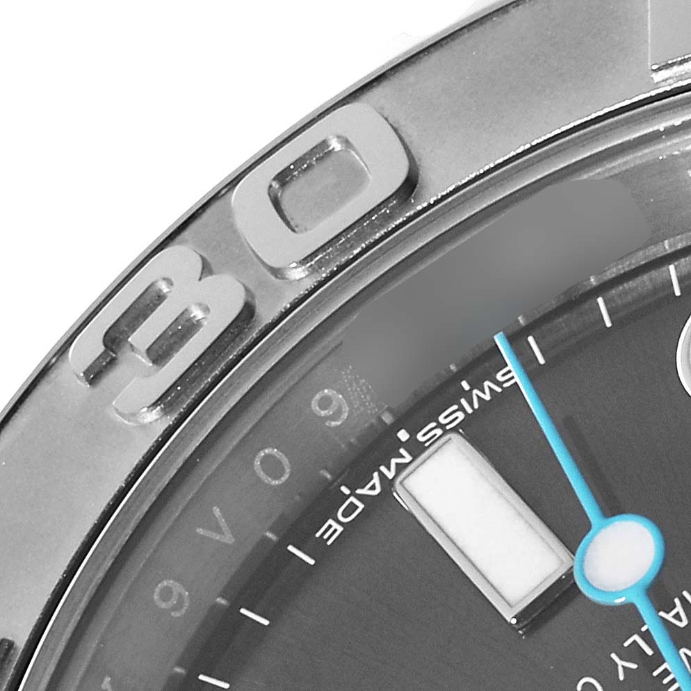 This close-up angle of the Rolex Yacht-Master 116622 Men
s Stainless Steel Grey Dial 116622 Men
s Stainless Steel Grey Dial watch showcases the bezel, part of the dial, and the minute hand.