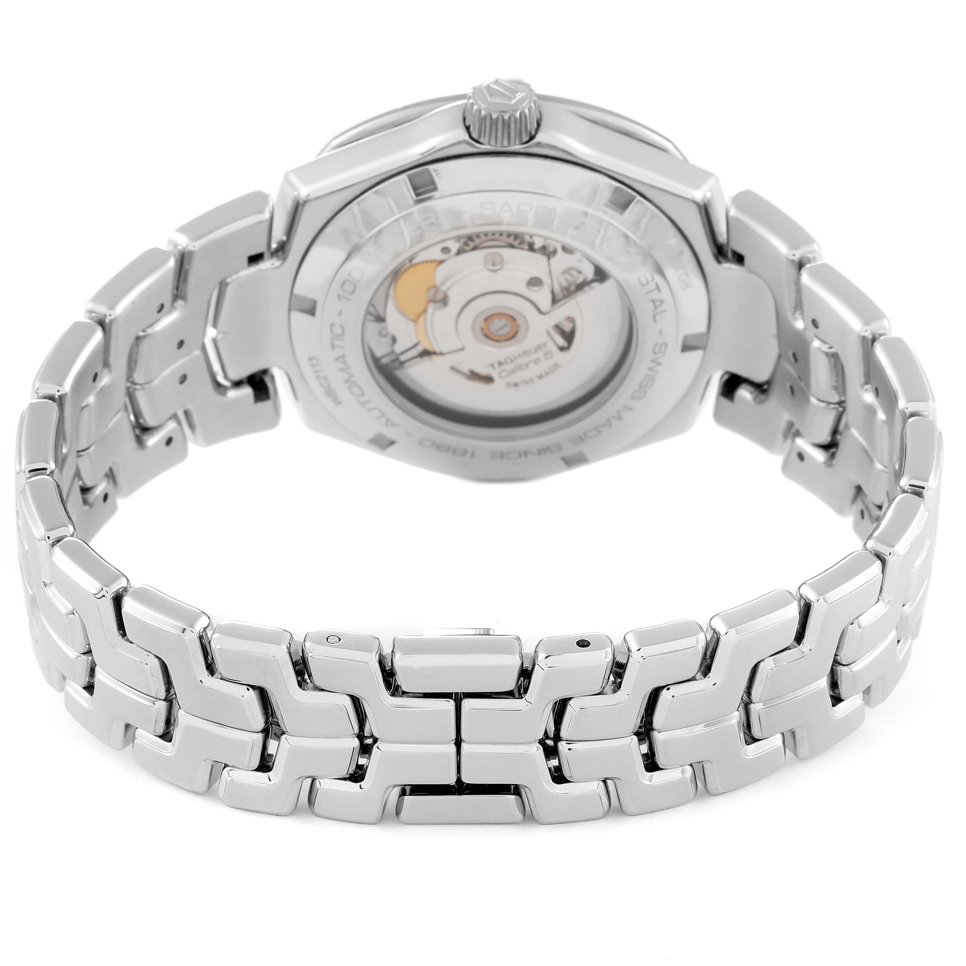 This image shows the back view of a Tag Heuer Link WBC2113.BA0603 Men's Stainless Steel Blue Dial WBC2113.BA0603 Men's Stainless Steel Blue Dial model watch, highlighting the bracelet and the exhibition case back.