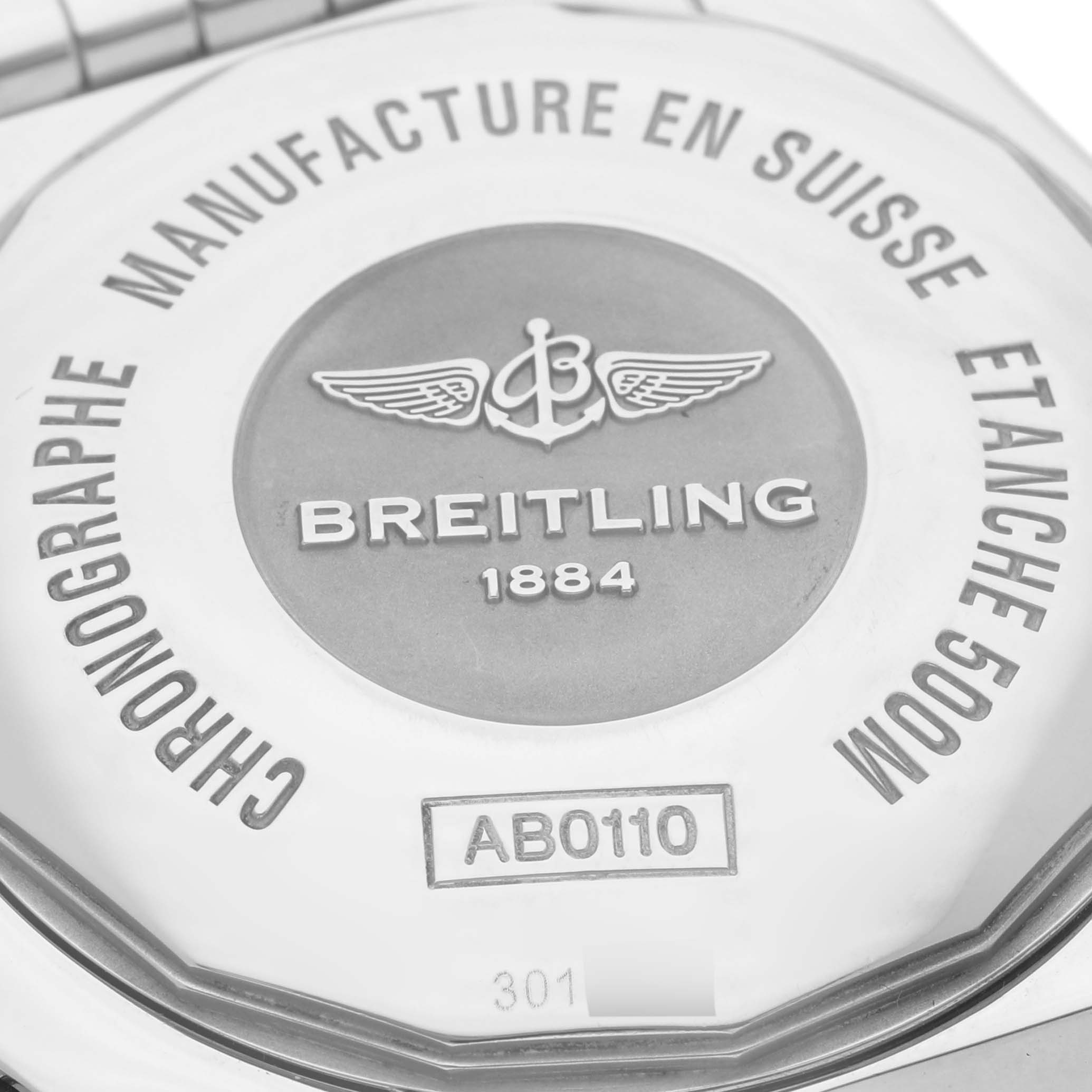 The image shows the back case of a Breitling Chronomat AB0110/A011C89PA Men's Stainless Steel Blue Dial AB0110/A011C89PA Men's Stainless Steel Blue Dial watch, displaying its logo and water resistance details.