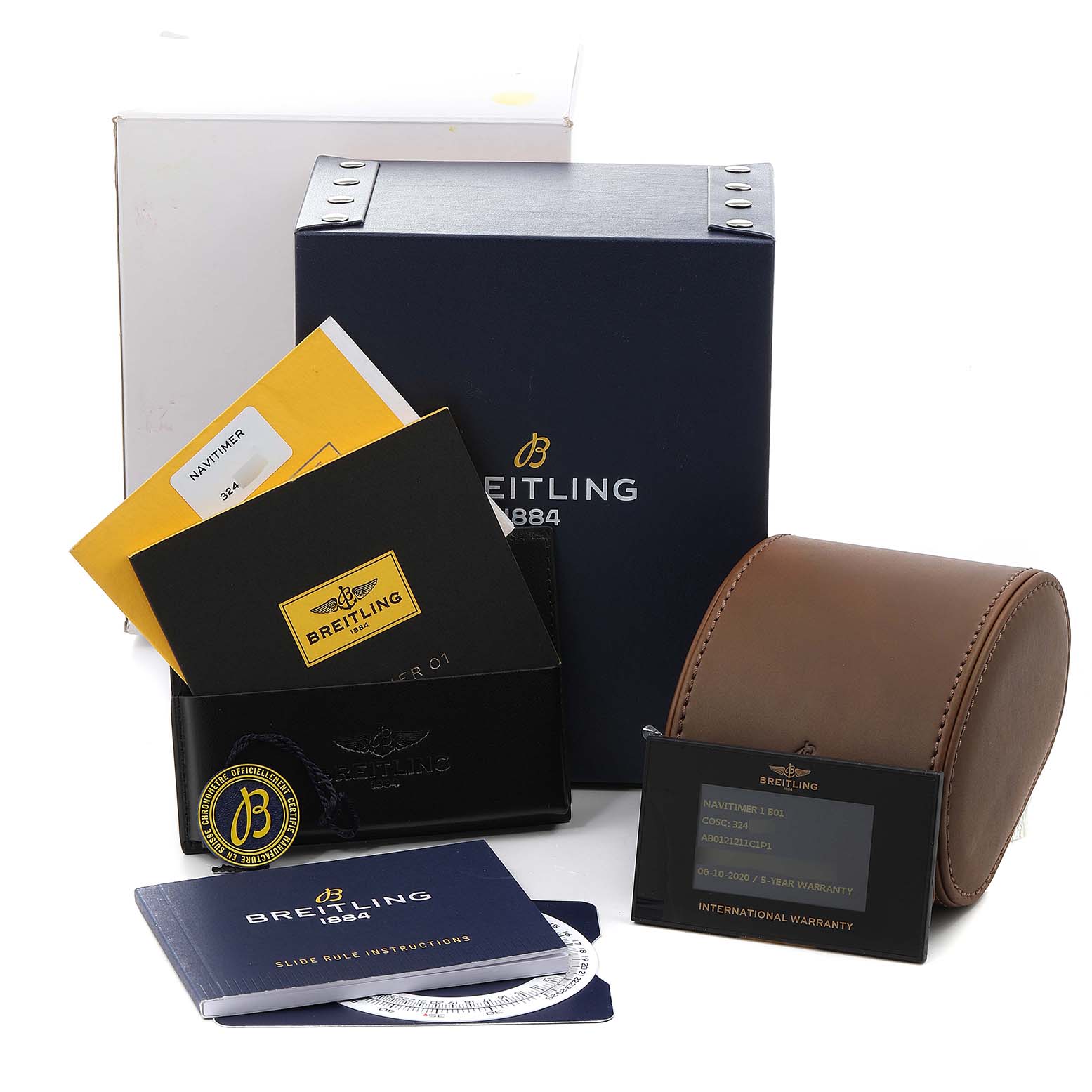 This image shows the packaging and accessories for a Breitling Navitimer AB0121C4-C920-731P Men's Stainless Steel Blue Dial AB0121C4-C920-731P Men's Stainless Steel Blue Dial watch, including boxes, booklets, and warranty card.