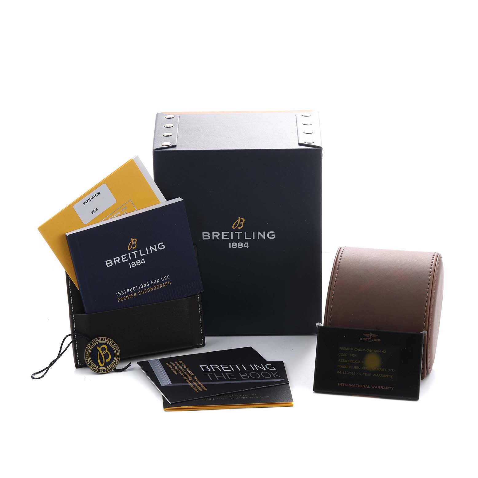 The image shows accessories for the Breitling Premier A13315 Men's Stainless Steel Blue Dial model, including a box, booklets, and a leather watch pouch.
