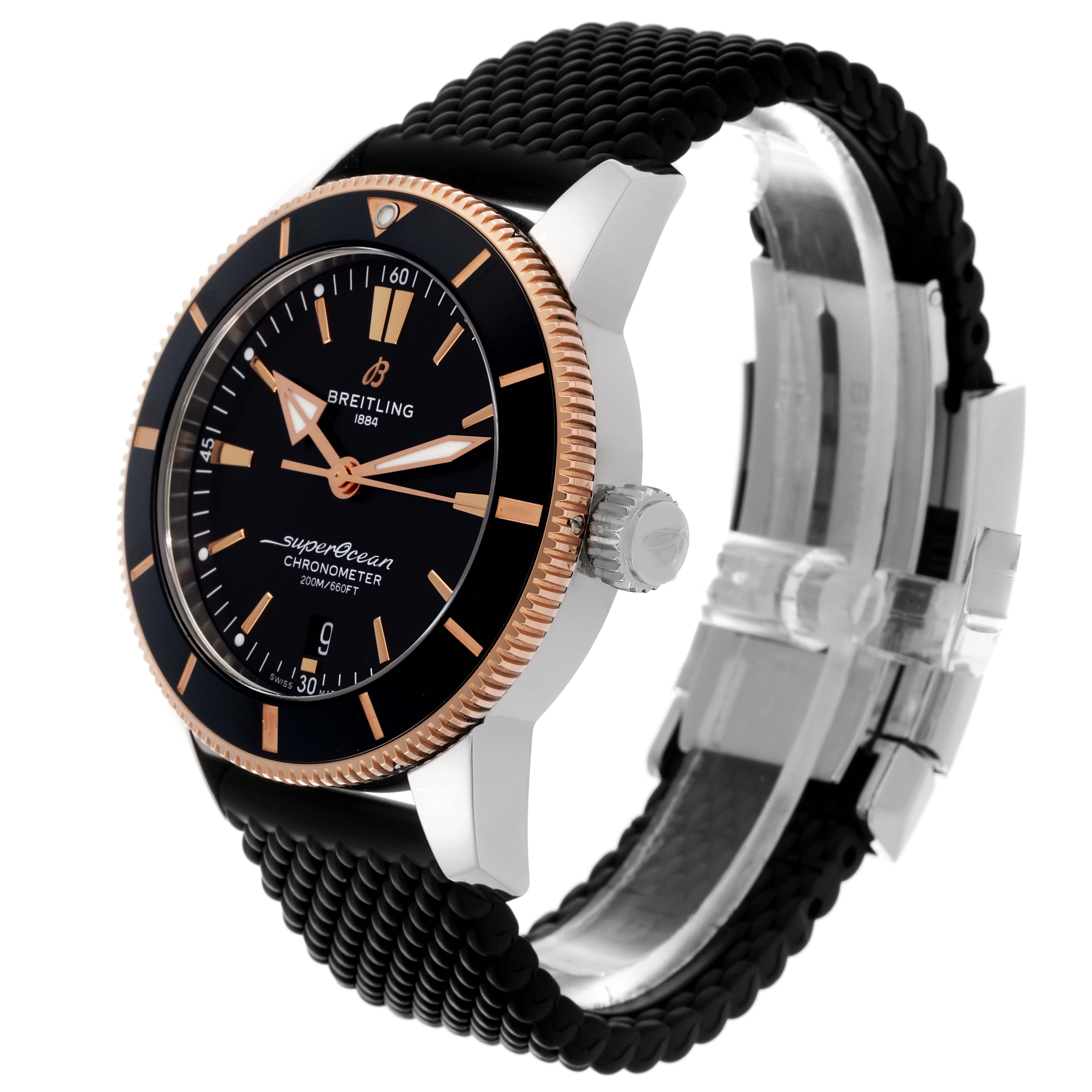 The Breitling Superocean UB2030 Men's Steel and Gold (two tone) Black Dial UB2030 Men's Steel and Gold (two tone) Black Dial watch is shown from a side angle, highlighting the dial, bezel, crown, and textured strap.