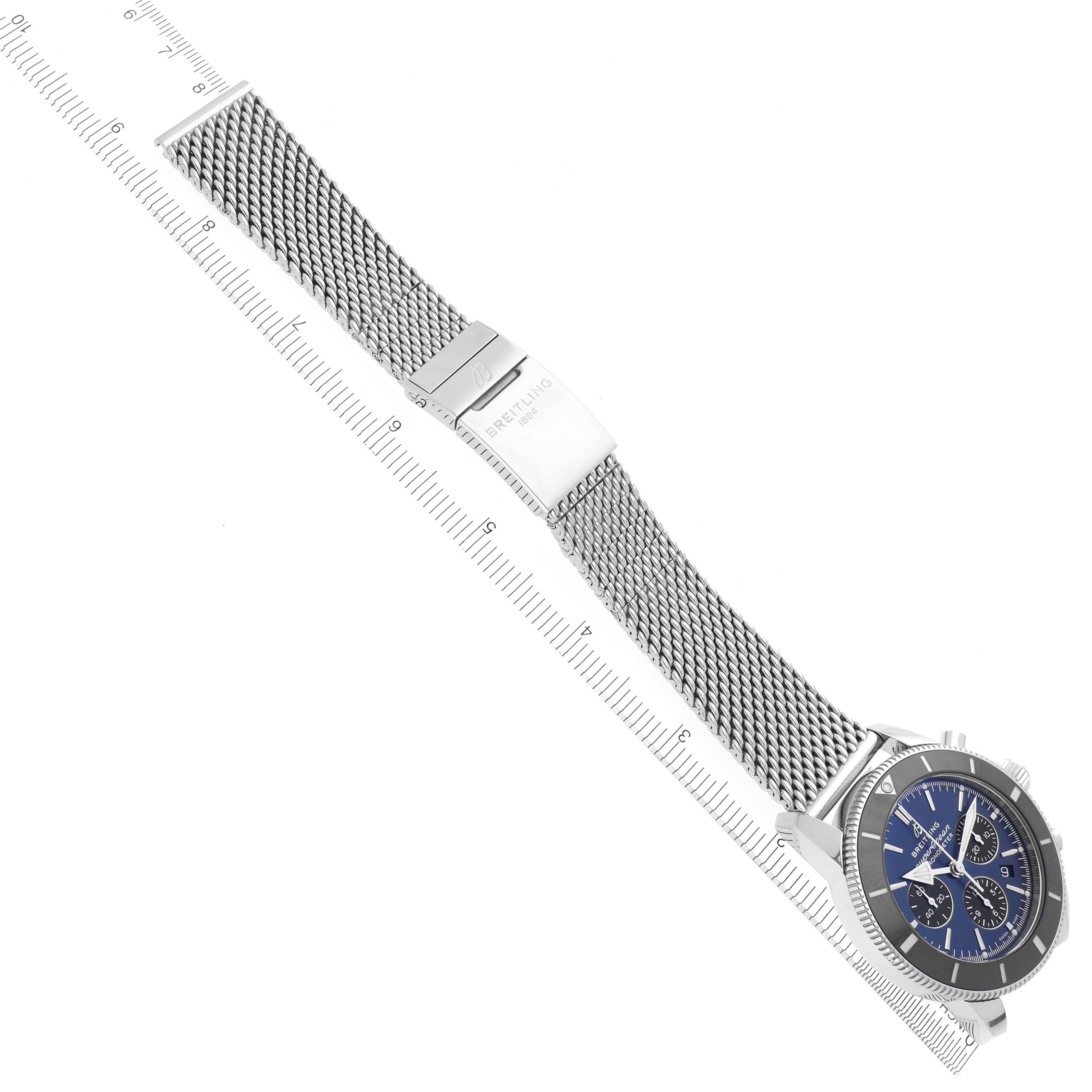 The Breitling Superocean AB0162 Men's Stainless Steel Blue Dial AB0162 Men's Stainless Steel Blue Dial watch is shown at a diagonal angle, highlighting the mesh bracelet, clasp, and blue dial.