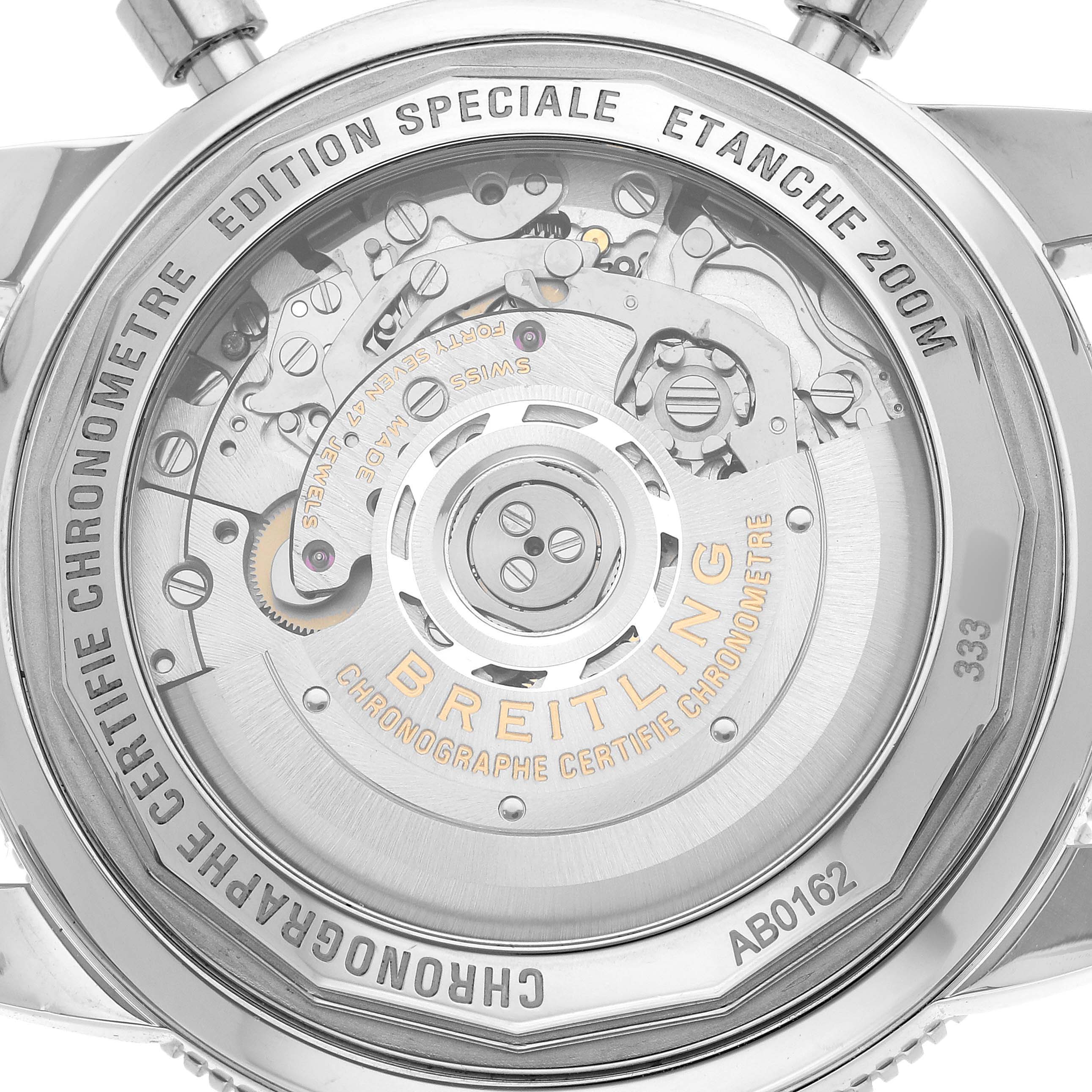 The image shows the back view of a Breitling Superocean AB0162 Men's Stainless Steel Silver Dial watch highlighting its mechanical movement and inscriptions.