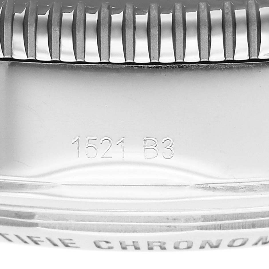 The image shows the side view of a Breitling Superocean AB0162 Men's Stainless Steel Silver Dial model's textured bezel and engraved reference numbers.