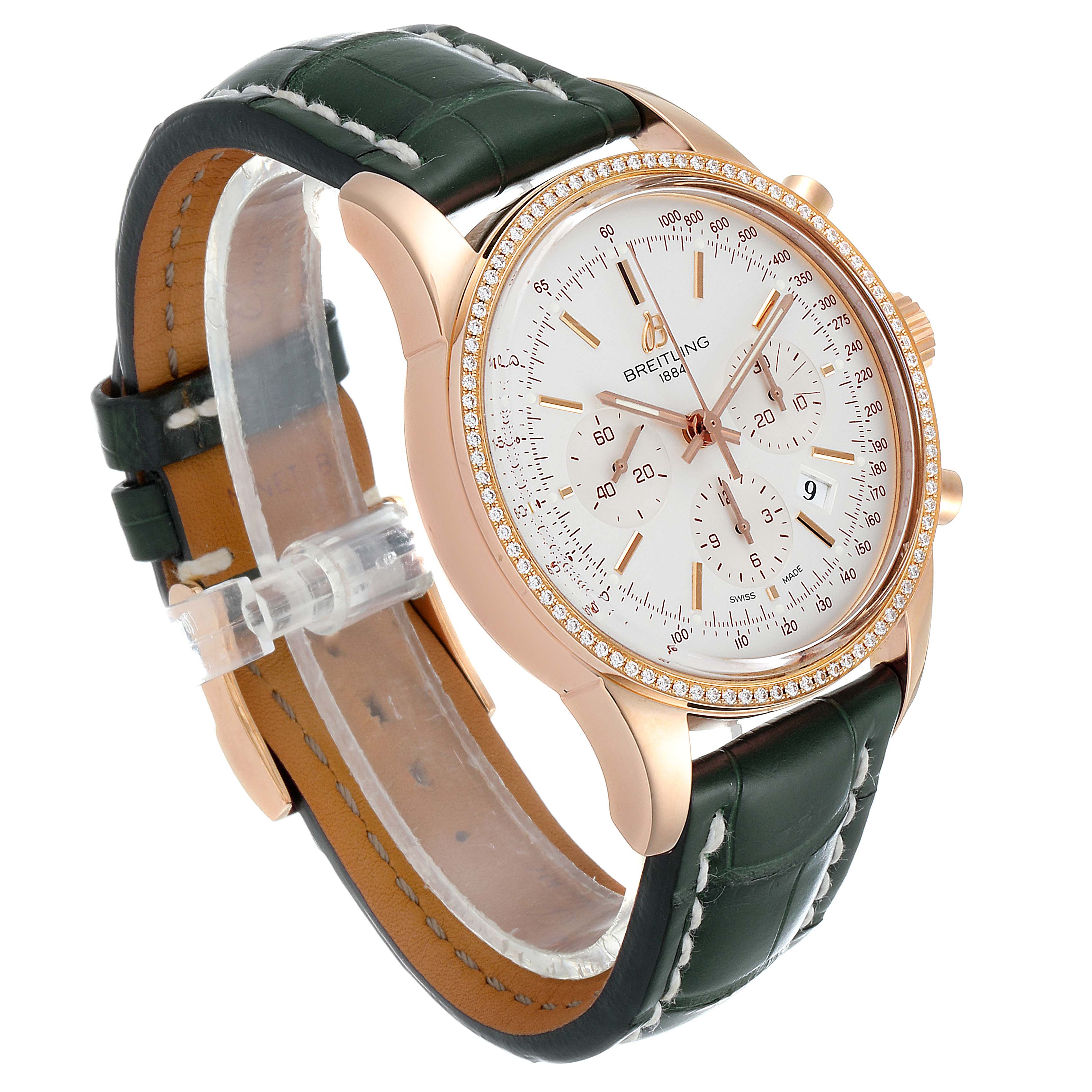 The Breitling Transocean RB0152 Men's Rose Gold Silver Dial RB0152 Men's Rose Gold Silver Dial watch is shown at an angle displaying the face, bezel, crown, and leather strap.