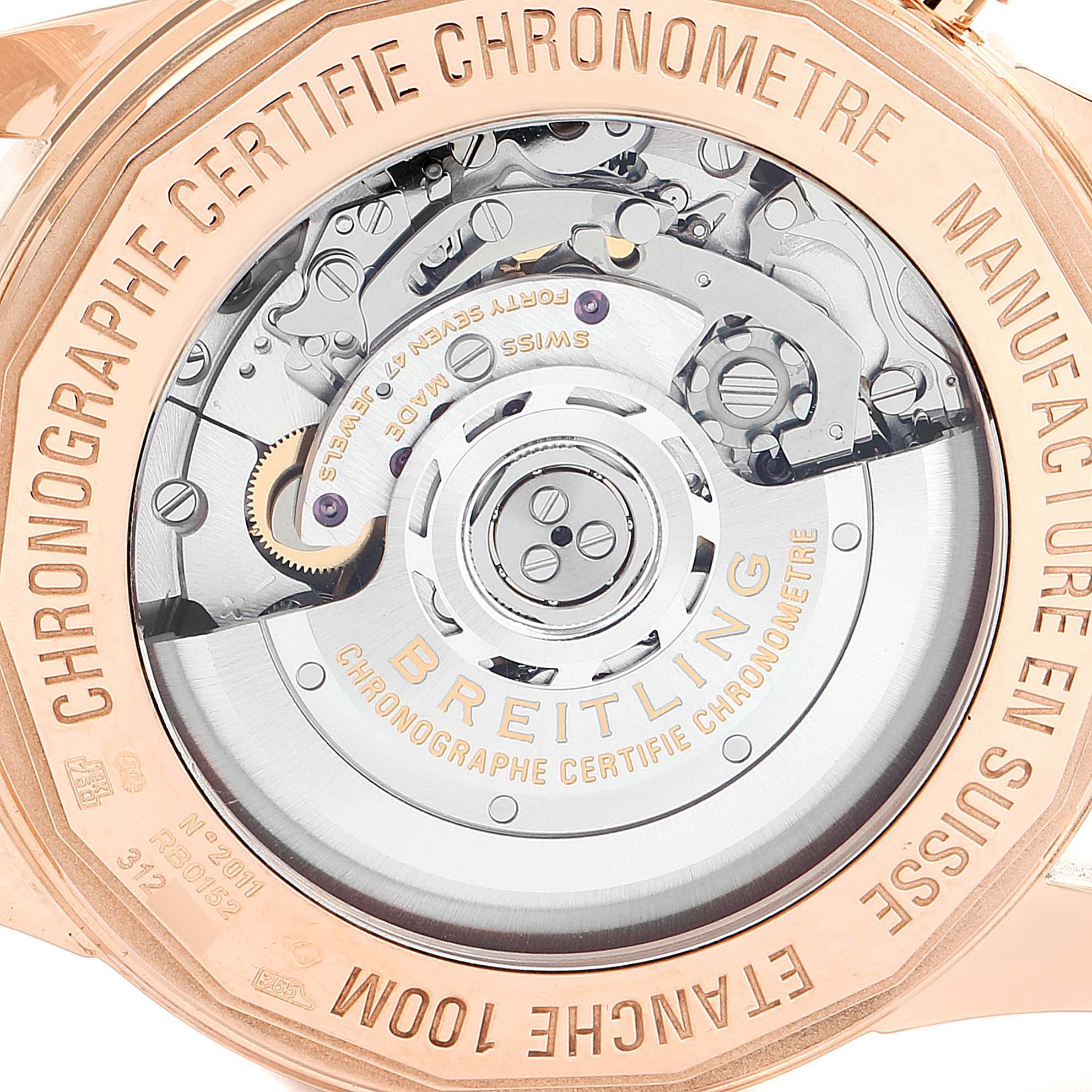 This image shows the backside of the Breitling Transocean RB0152 Men's Rose Gold Silver Dial RB0152 Men's Rose Gold Silver Dial watch, highlighting its internal movement and engraved details.