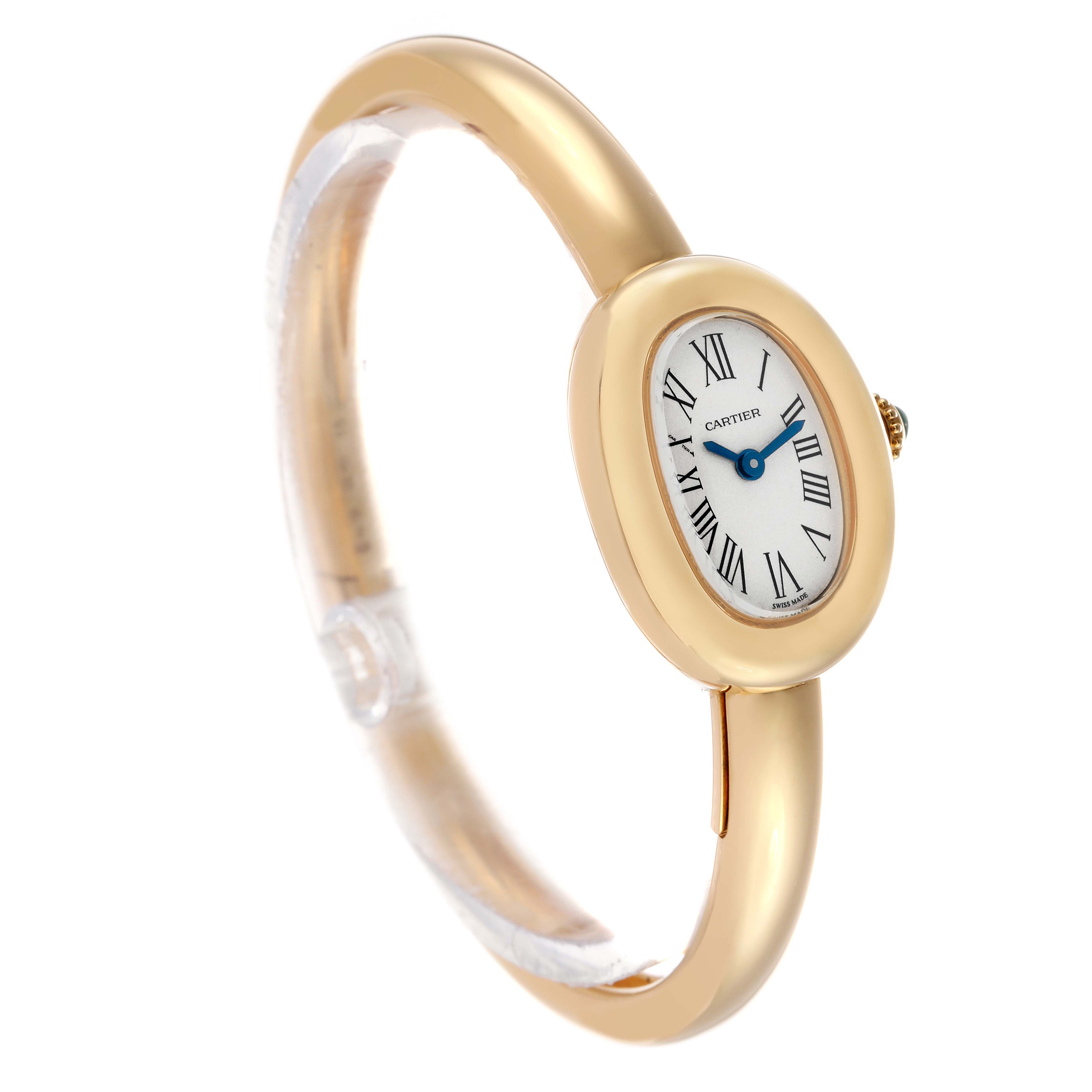 The Cartier Baignoire WGBA0018 Women's Yellow Gold Silver Dial watch is shown at a side angle, featuring its oval case, gold bracelet, and Roman numeral dial.