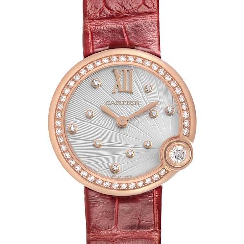 The Cartier Ballon Blanc WJBL0012 Women's Rose Gold Silver Dial watch is shown from a front angle, highlighting its diamond-studded bezel and red leather strap.