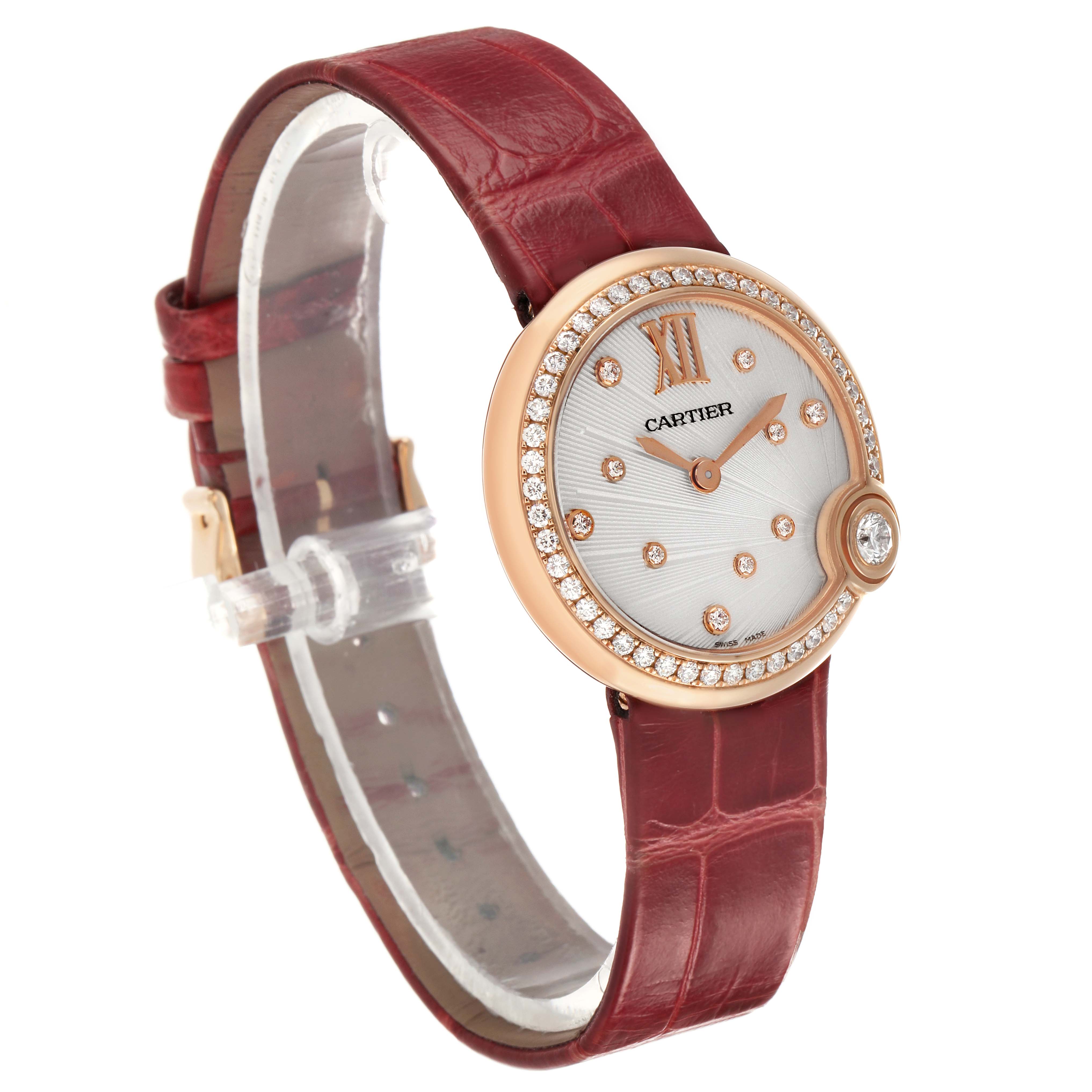 The Ballon Blanc de Cartier watch is shown at a three-quarter angle, highlighting the face, bezel, and strap.