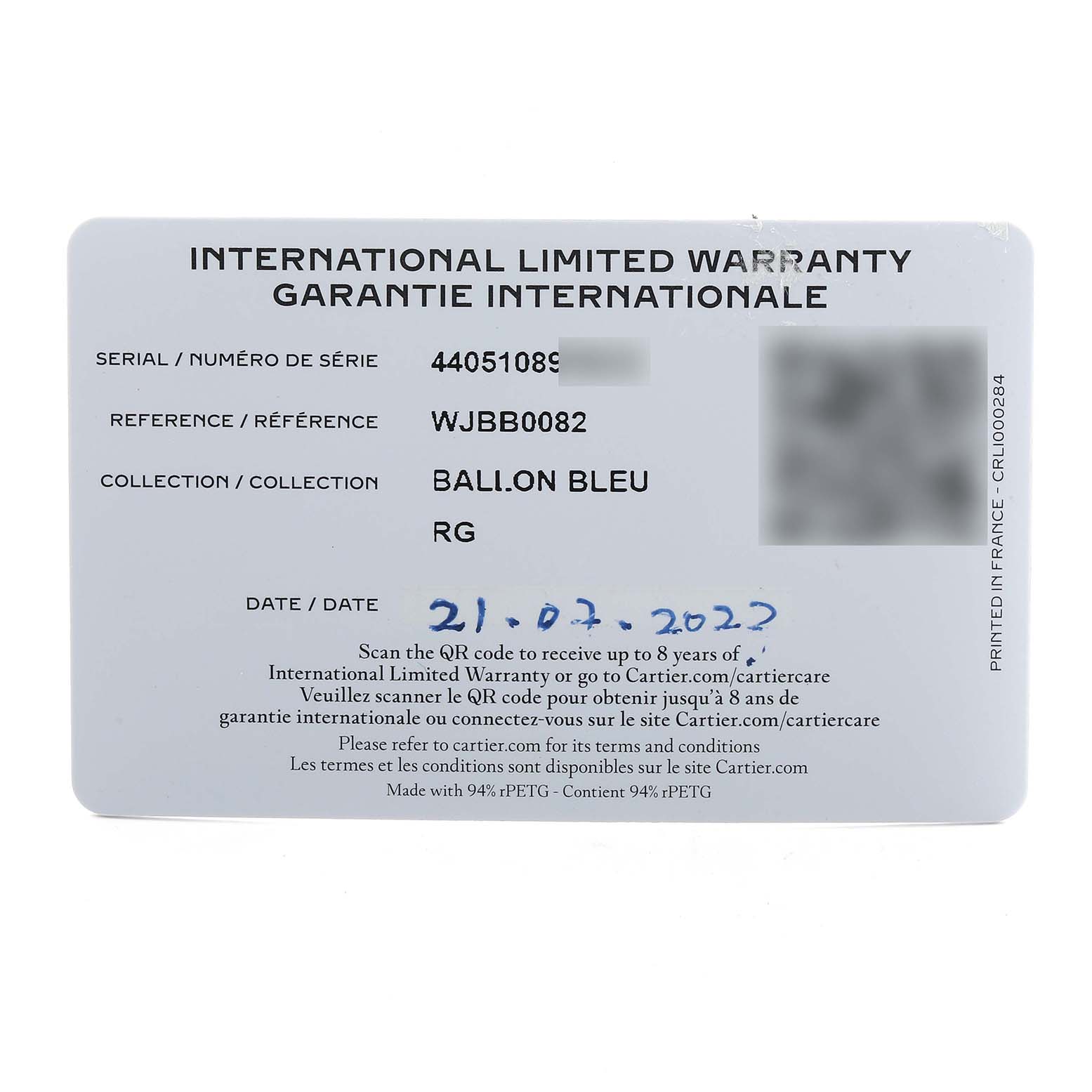 The image shows an International Limited Warranty card for a Cartier Ballon Bleu WJBB0082 Women's Rose Gold Silver Dial watch model.