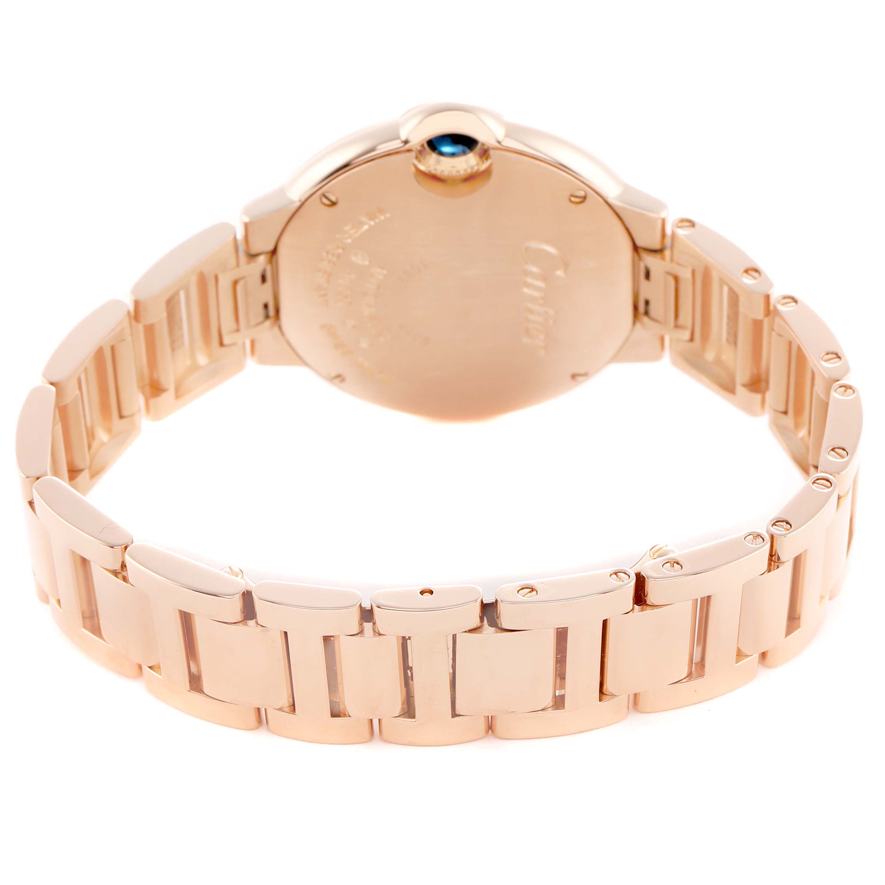 The image shows the back and part of the bracelet of a Cartier Ballon Bleu WJBB0082 Women's Rose Gold Silver Dial watch, highlighting its clasp and case back details.