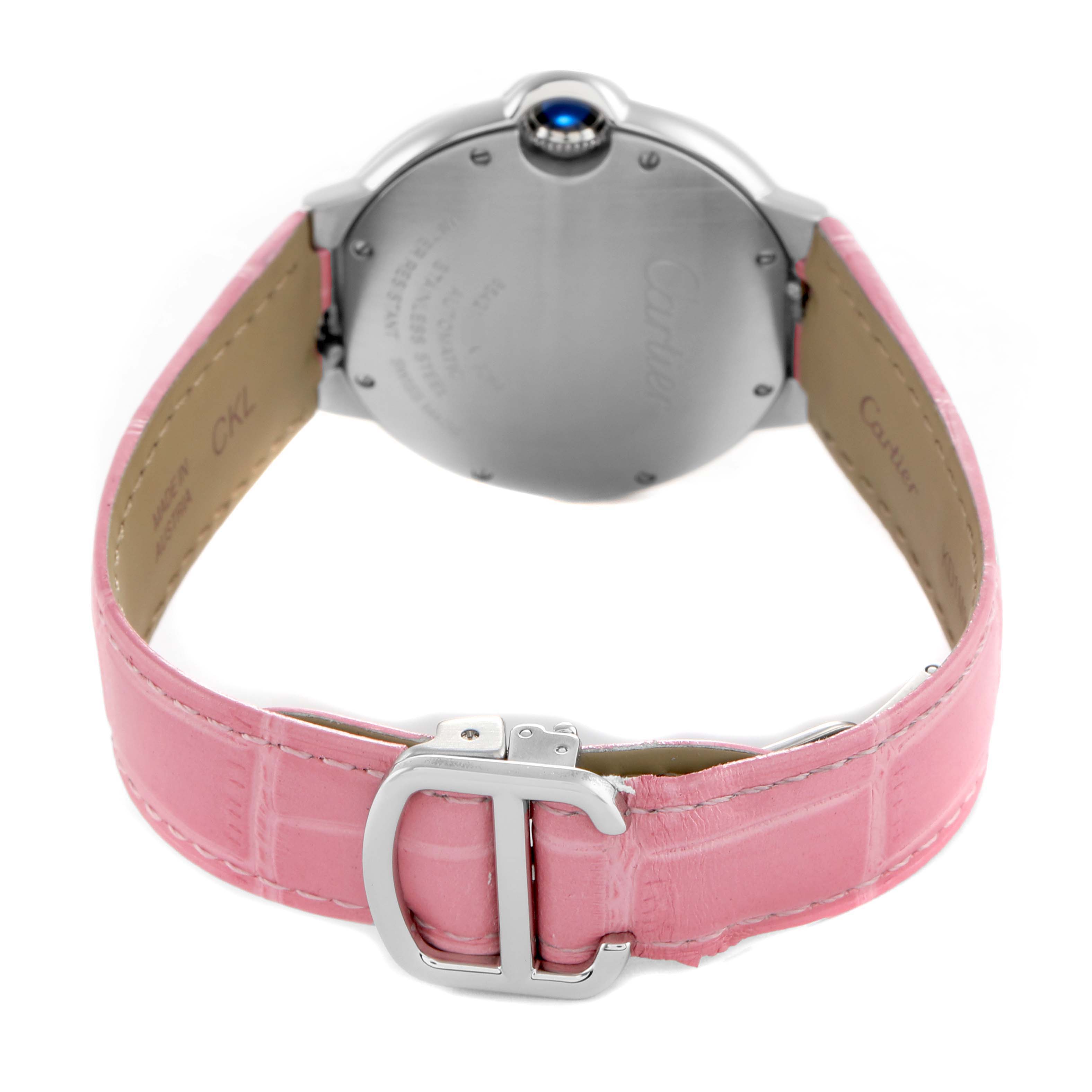 The image shows the back of a Cartier Ballon Bleu WSBB0007 Women's Stainless Steel Pink Dial watch, highlighting the case, crown, and pink strap with a buckle.
