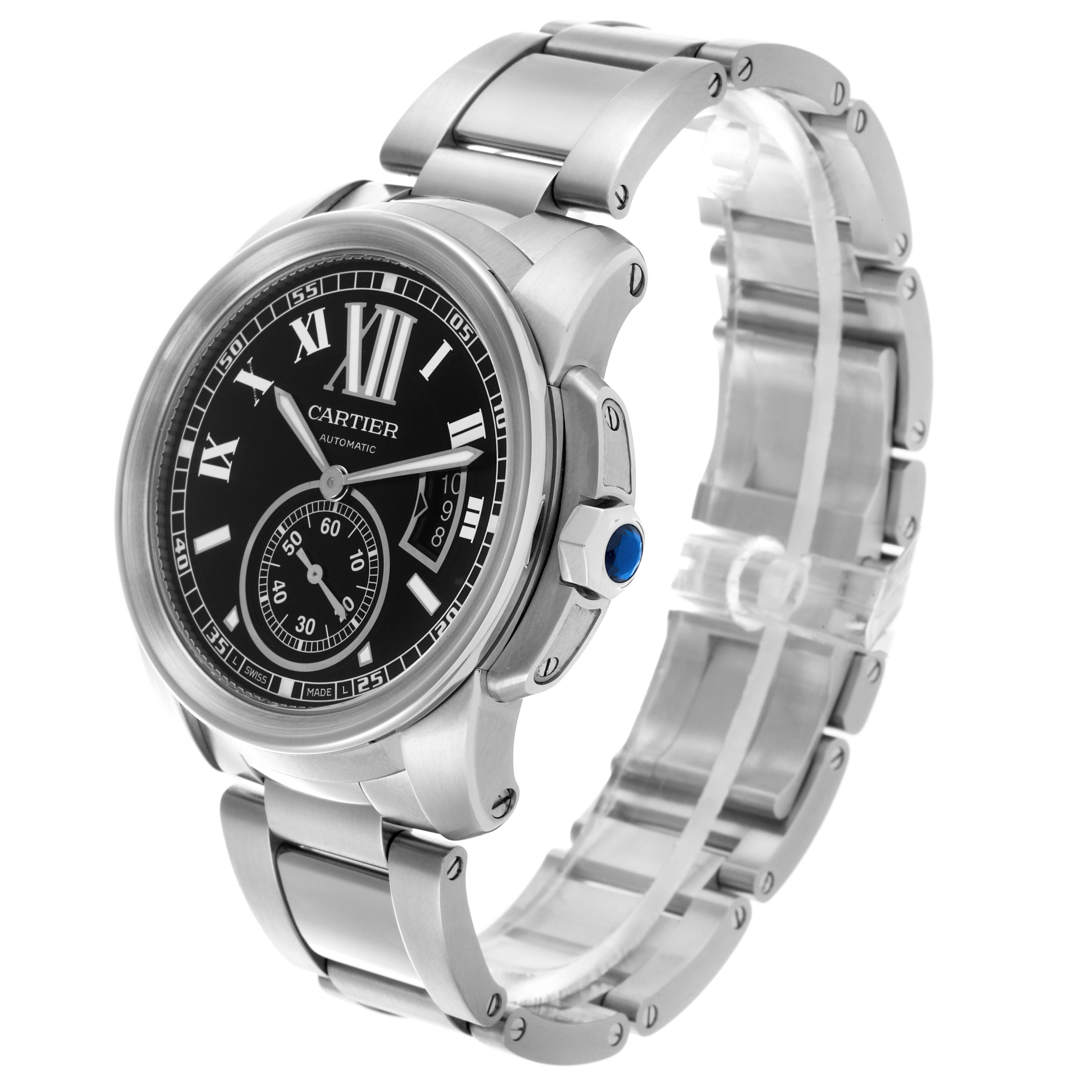 The Calibre de Cartier watch is shown at a slight angle, highlighting the face, crown, and stainless steel bracelet.