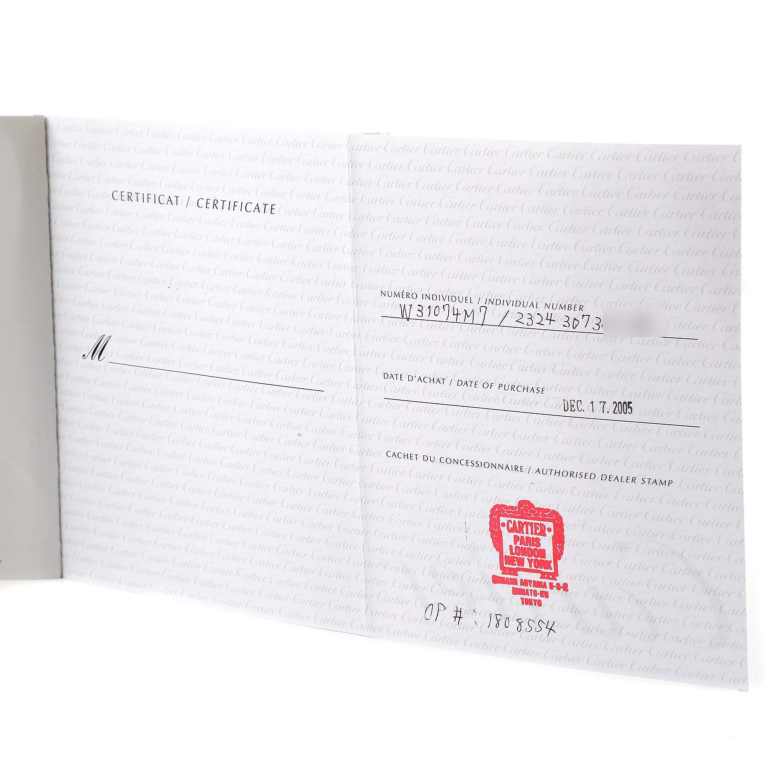 The image shows an open certificate booklet for the Cartier Pasha W31074M7 Men's Stainless Steel White Dial W31074M7 Men's Stainless Steel White Dial model, displaying the individual number and date of purchase.