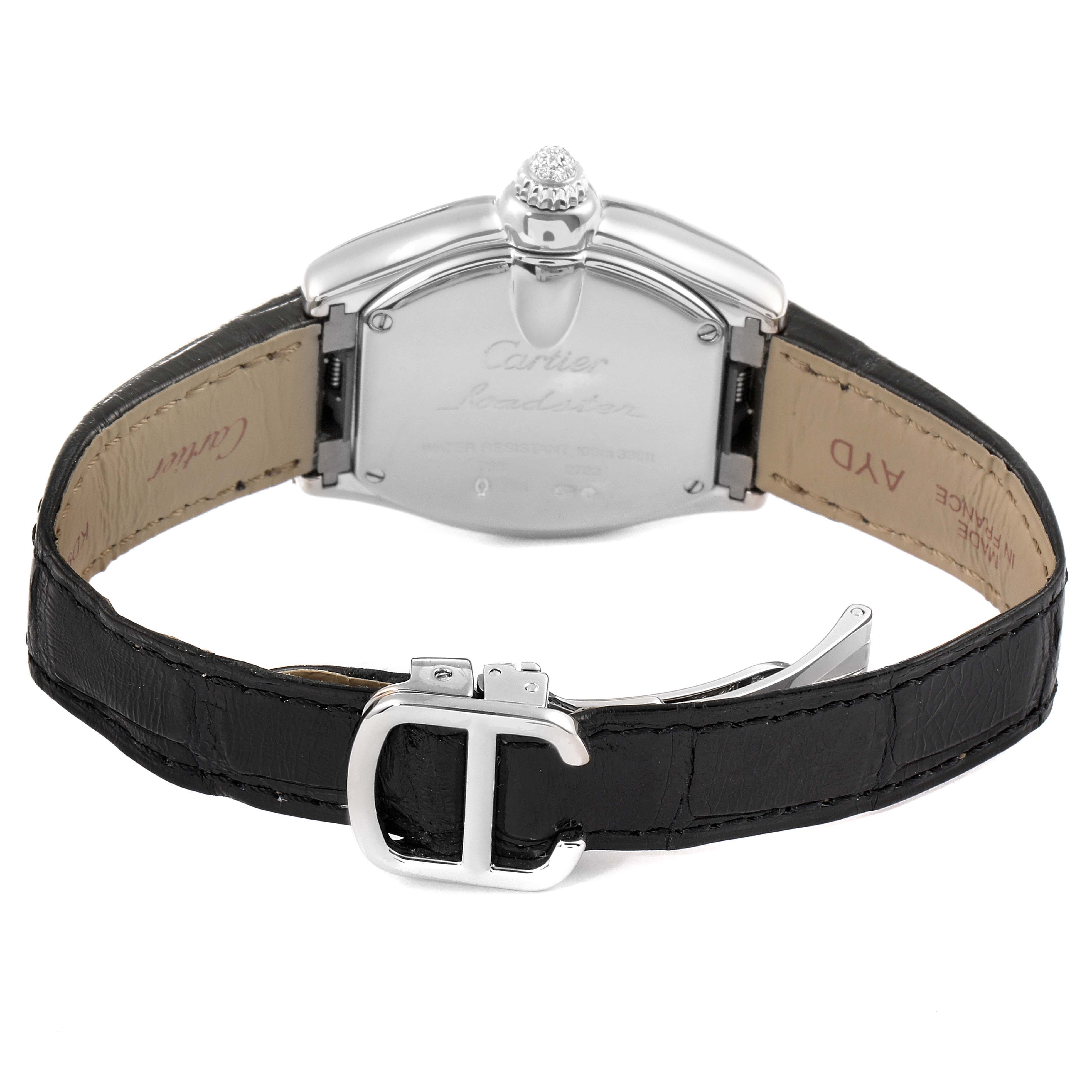 This image displays the back of a Cartier Roadster WE500260 Women
s White Gold Silver Dial WE500260 Women
s White Gold Silver Dial watch, featuring the caseback, crown, and leather strap with a clasp.