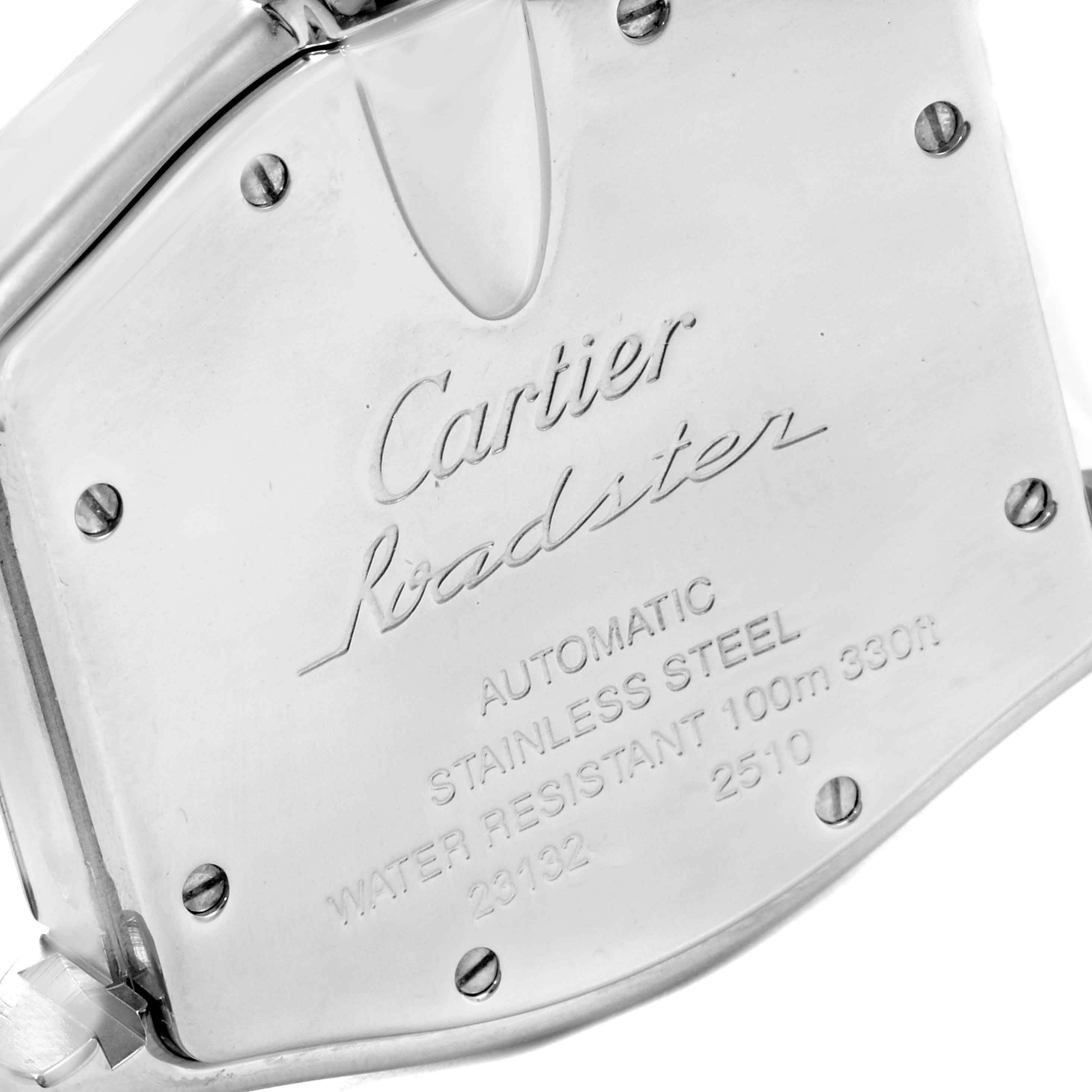 The image shows the back case of a Cartier Roadster W62025V3 Men
s Stainless Steel Silver Dial W62025V3 Men
s Stainless Steel Silver Dial watch, highlighting its engravings and screws.