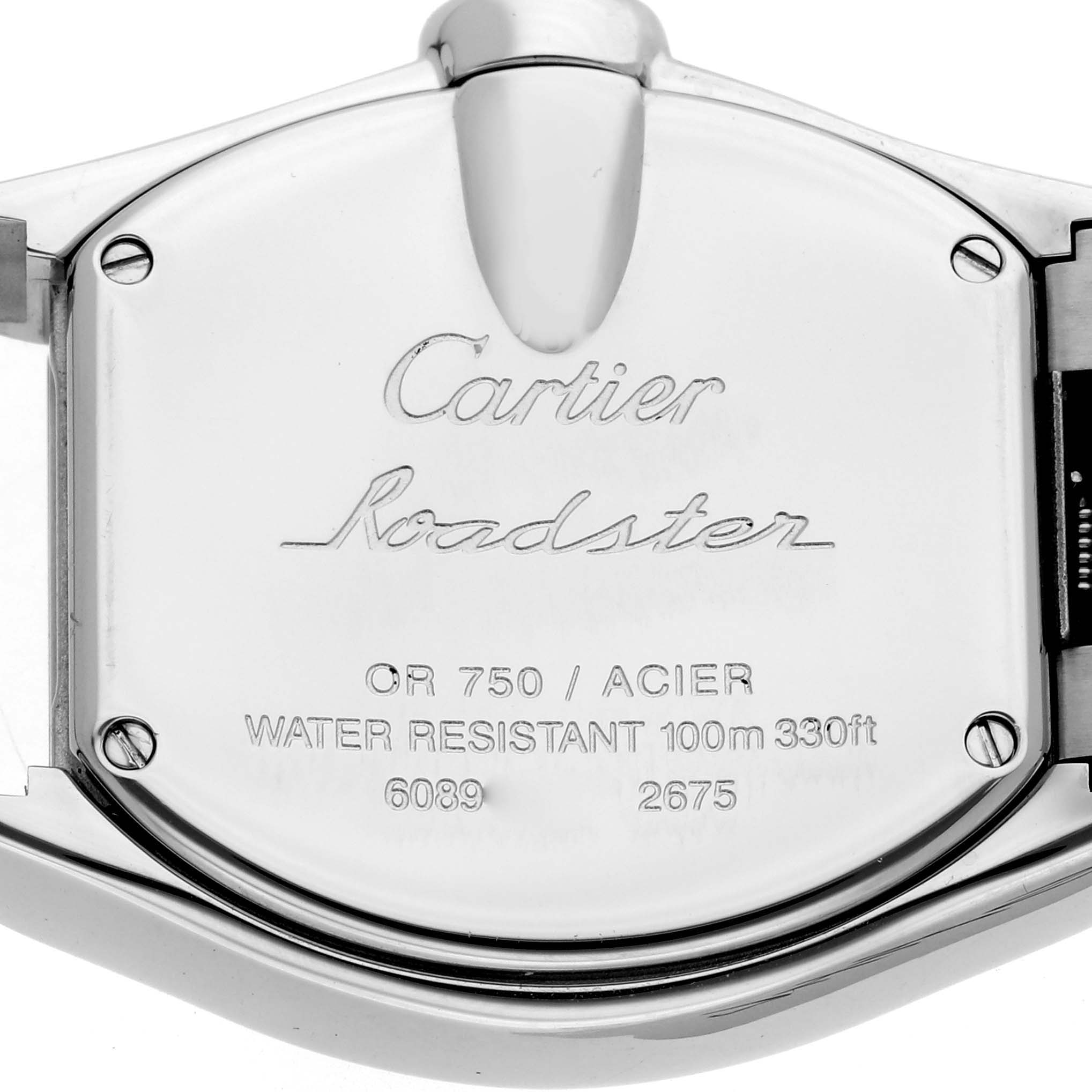 The image shows the back case of the Cartier Roadster W62026Y4 Women's Steel and Gold (two tone) Silver Dial watch with engraved details.
