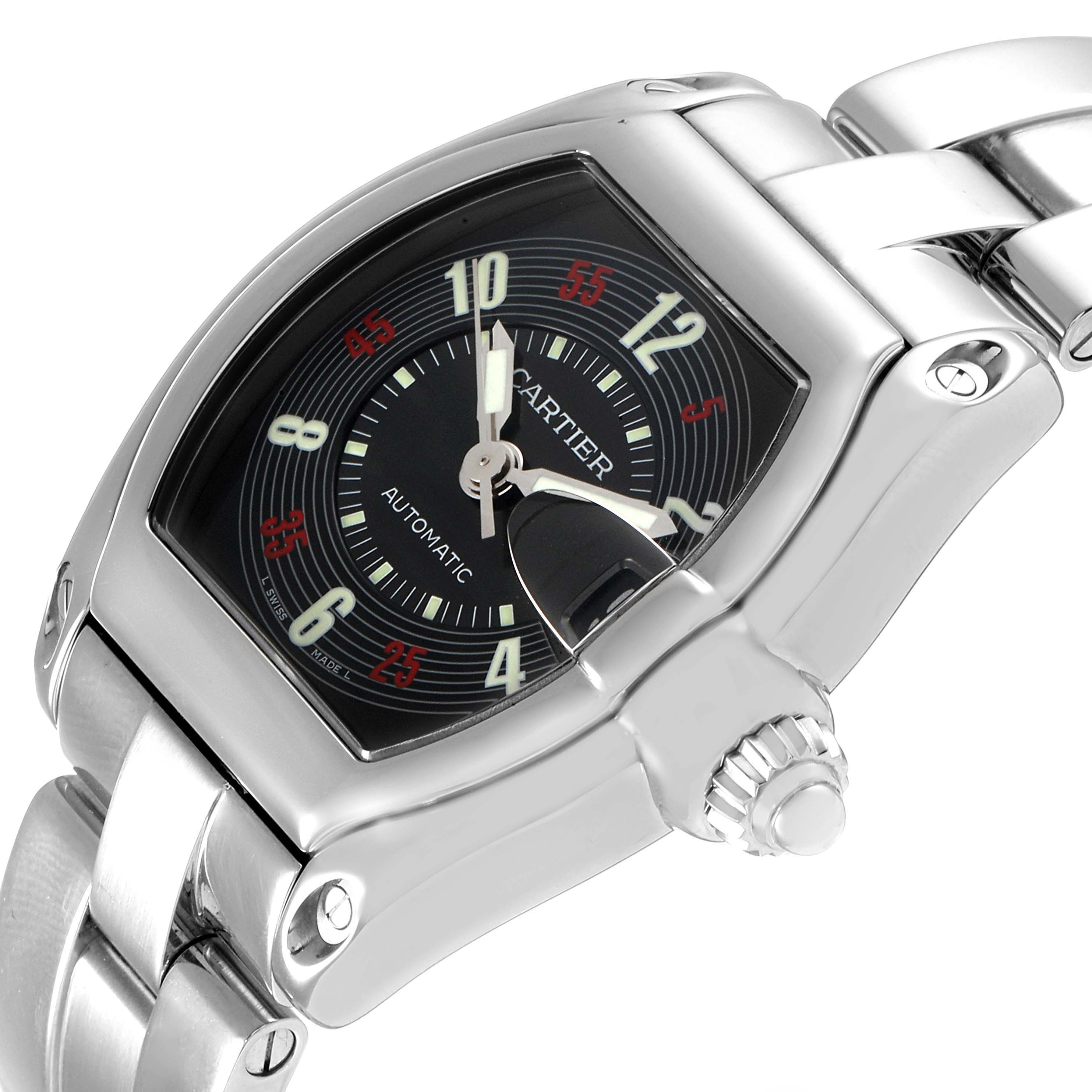 The image shows a close-up angle of a Cartier Roadster W62002V3 Men
s Stainless Steel Black Dial W62002V3 Men
s Stainless Steel Black Dial watch, highlighting its face, crown, and metal bracelet.