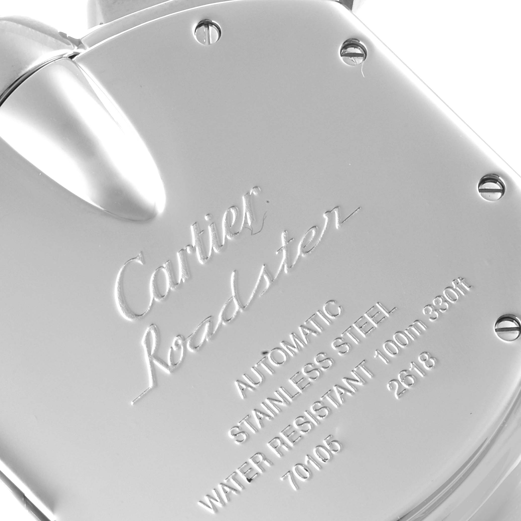 This image shows a close-up of the engraved case back of a Cartier Roadster W62020X6 Men
s Stainless Steel Black Dial W62020X6 Men
s Stainless Steel Black Dial watch.
